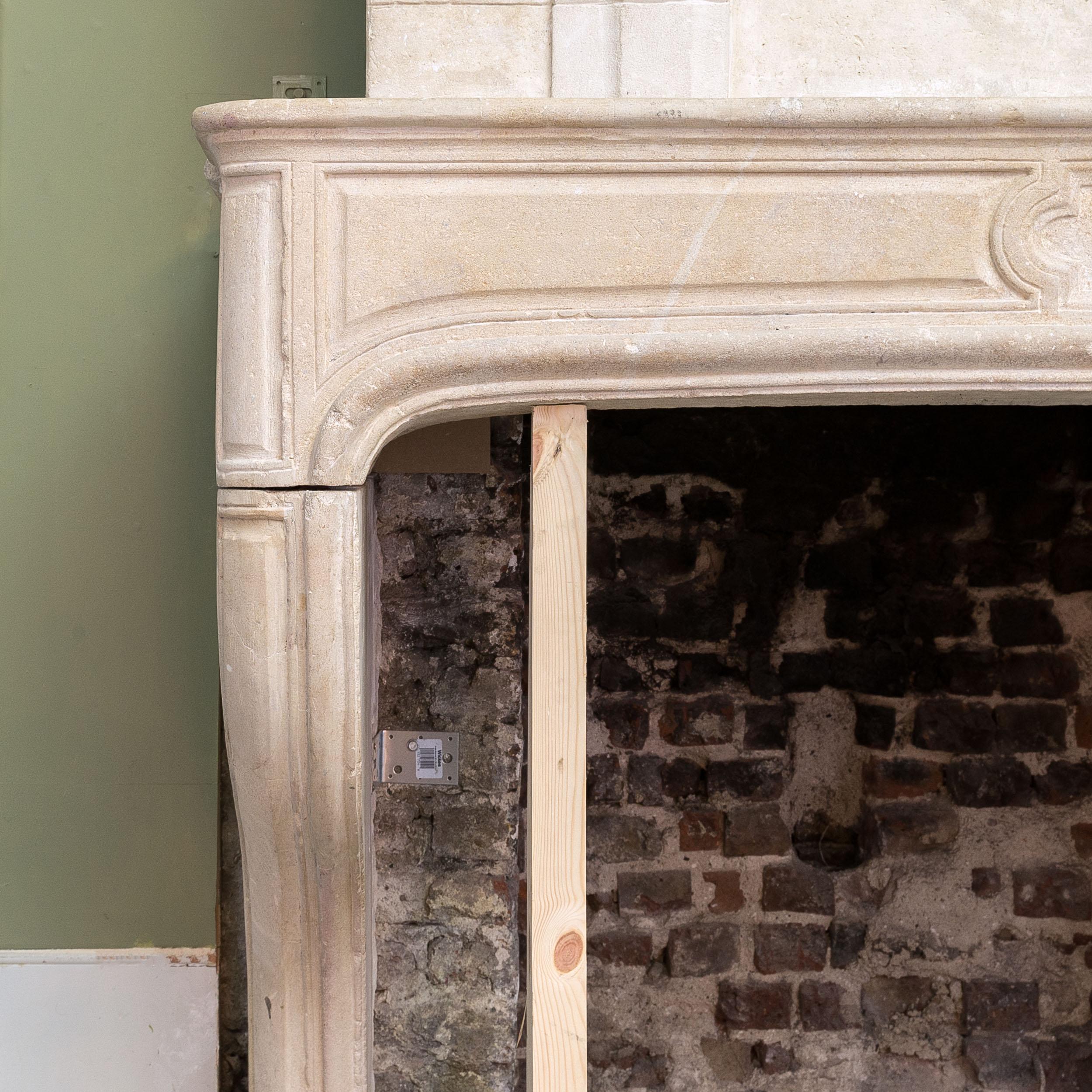 18th Century and Earlier Impessive Louis XVI Limestone Chimneypiece For Sale