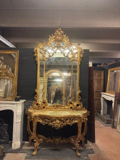Imposing console table with table and mirror in set, carved and gilded, italy