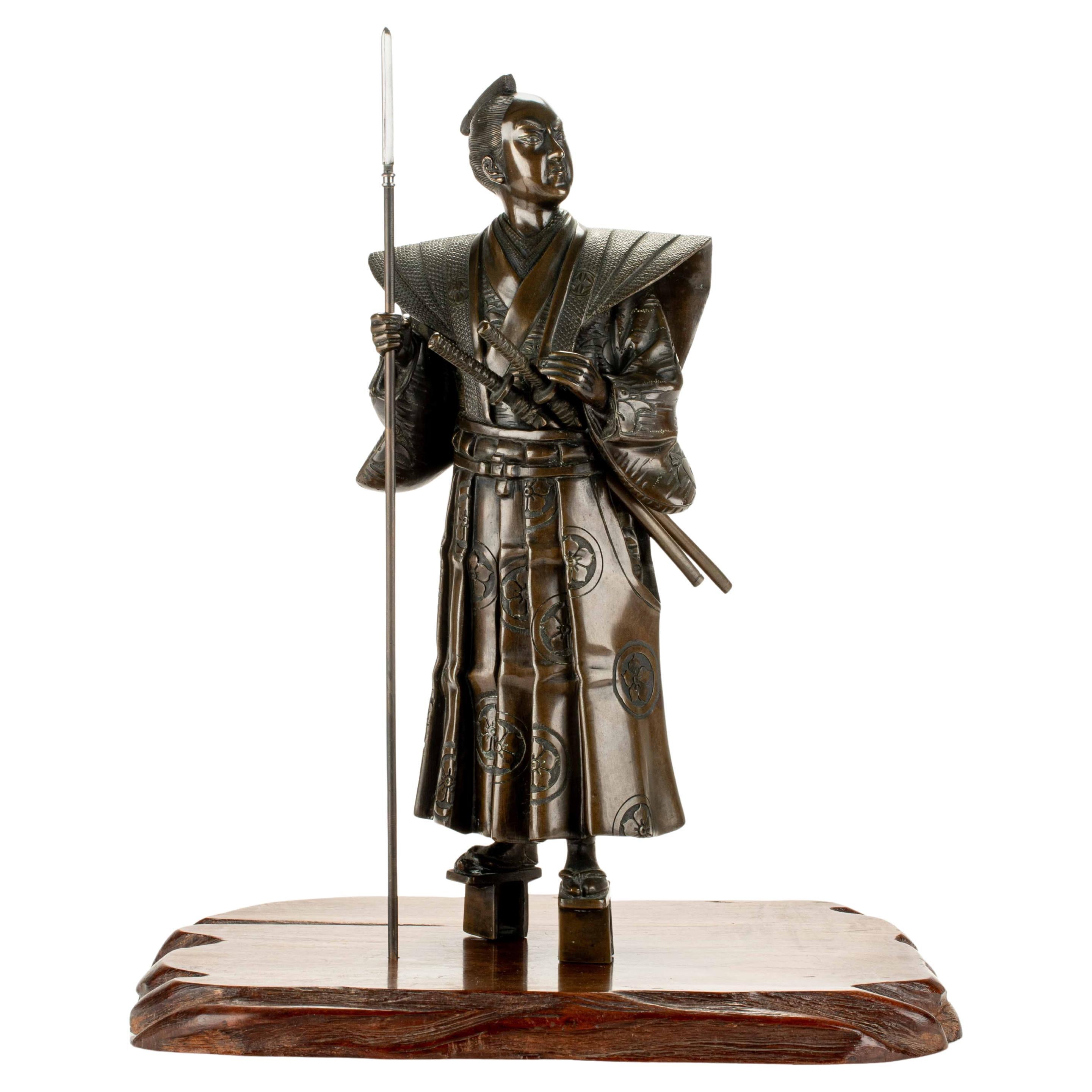 Impressive bronze sculpture depicting a samurai, signedYoshimitsu
