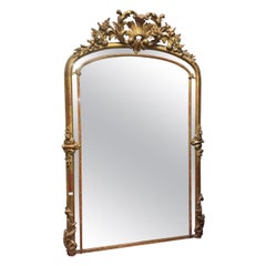 Impressive carved and gilded wooden mirror cabinet, italy