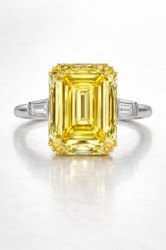 Important 10.96 Carat Natural Fancy Yellow Emerald Cut Diamond Ring
