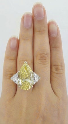 Important 15.01 Carat Fancy Yellow Pear-Shaped Diamond Ring