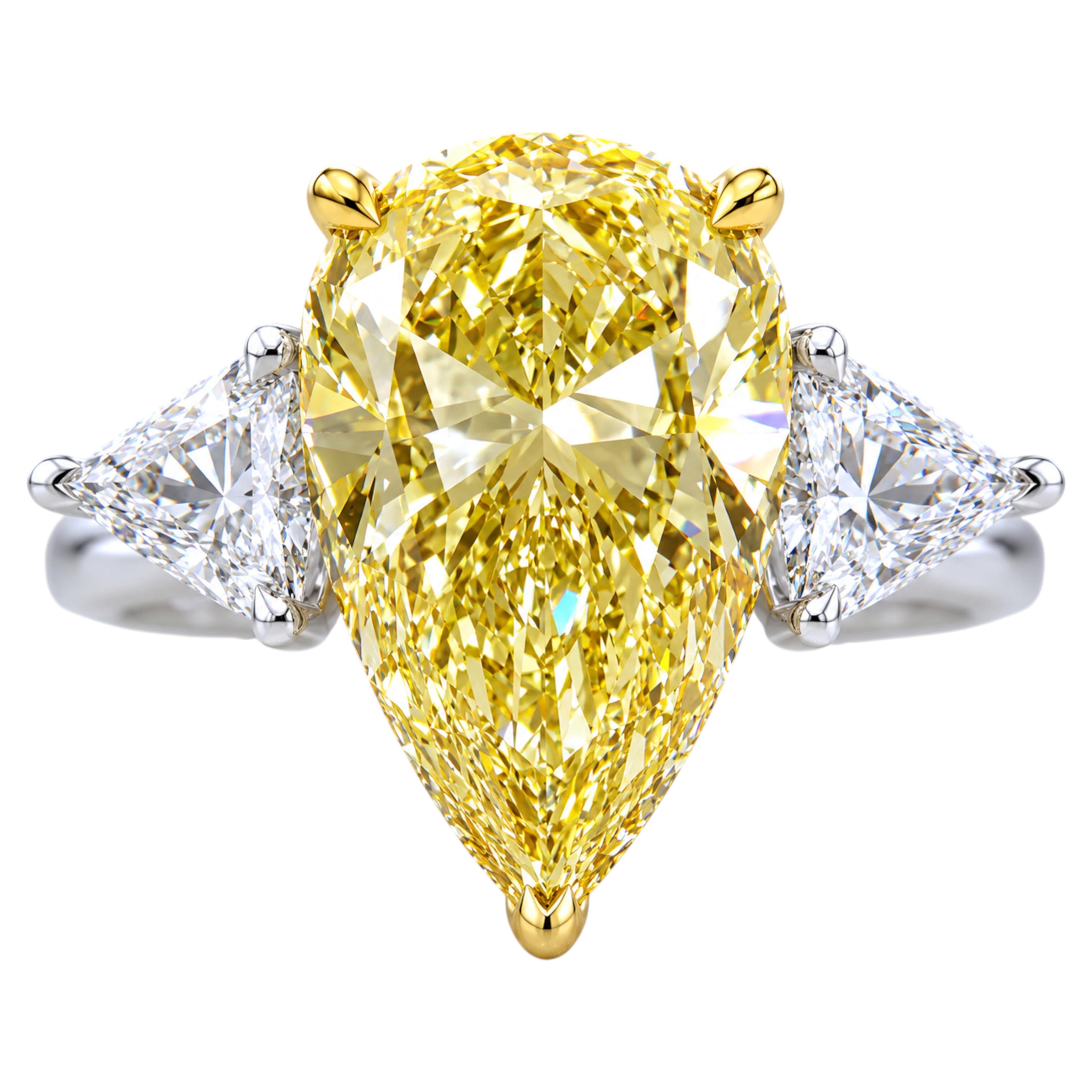 Important 15.01 Carat Fancy Yellow Pear-Shaped Diamond Ring