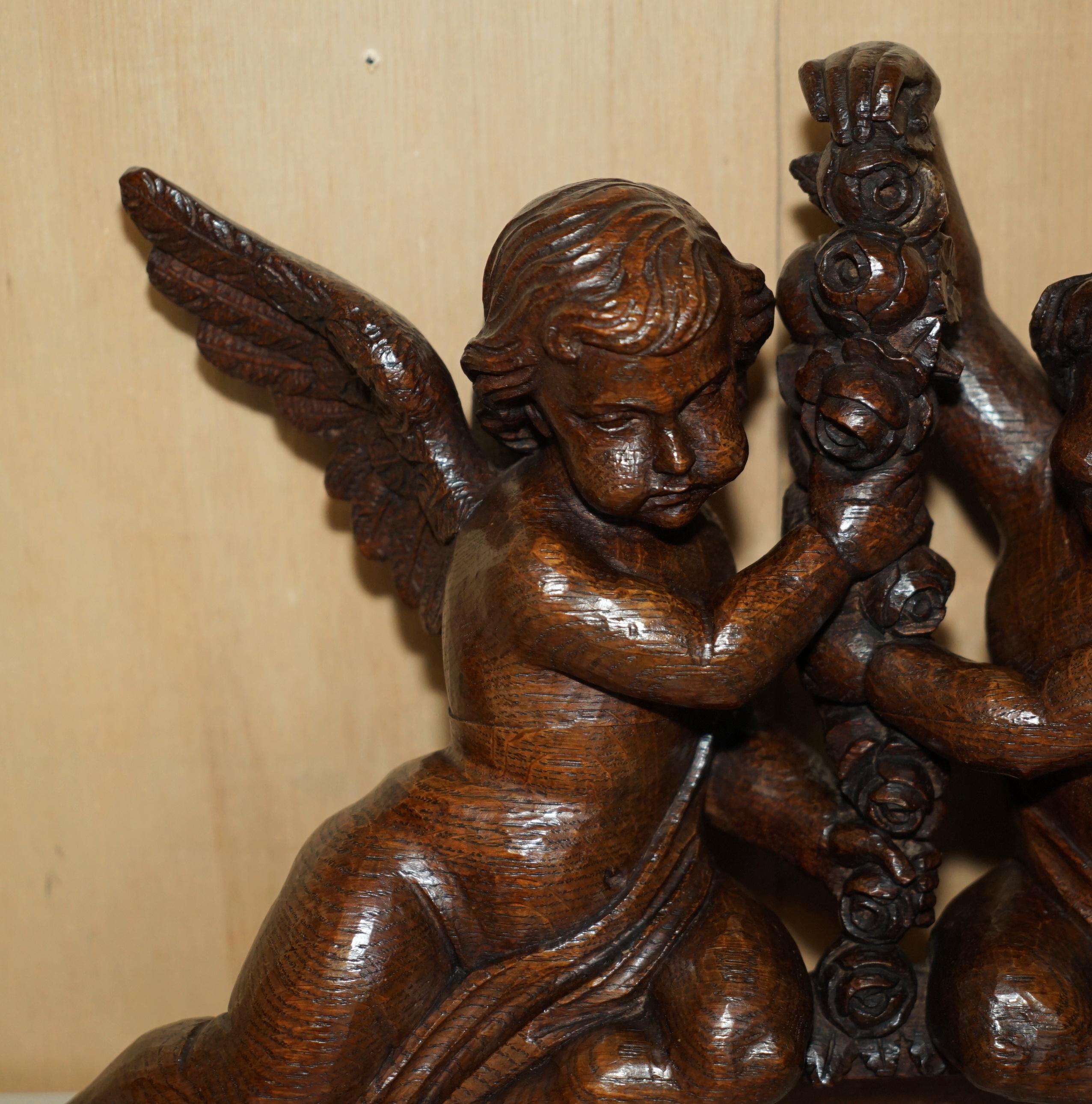 Royal House Antiques

Royal House Antiques is delighted to offer for sale lovely hand carved 17th century wall Surmount Circa 1640-1680 depicting winged Cherub Angels holding flowers 

This is an important and well made carving, it's in wonderful
