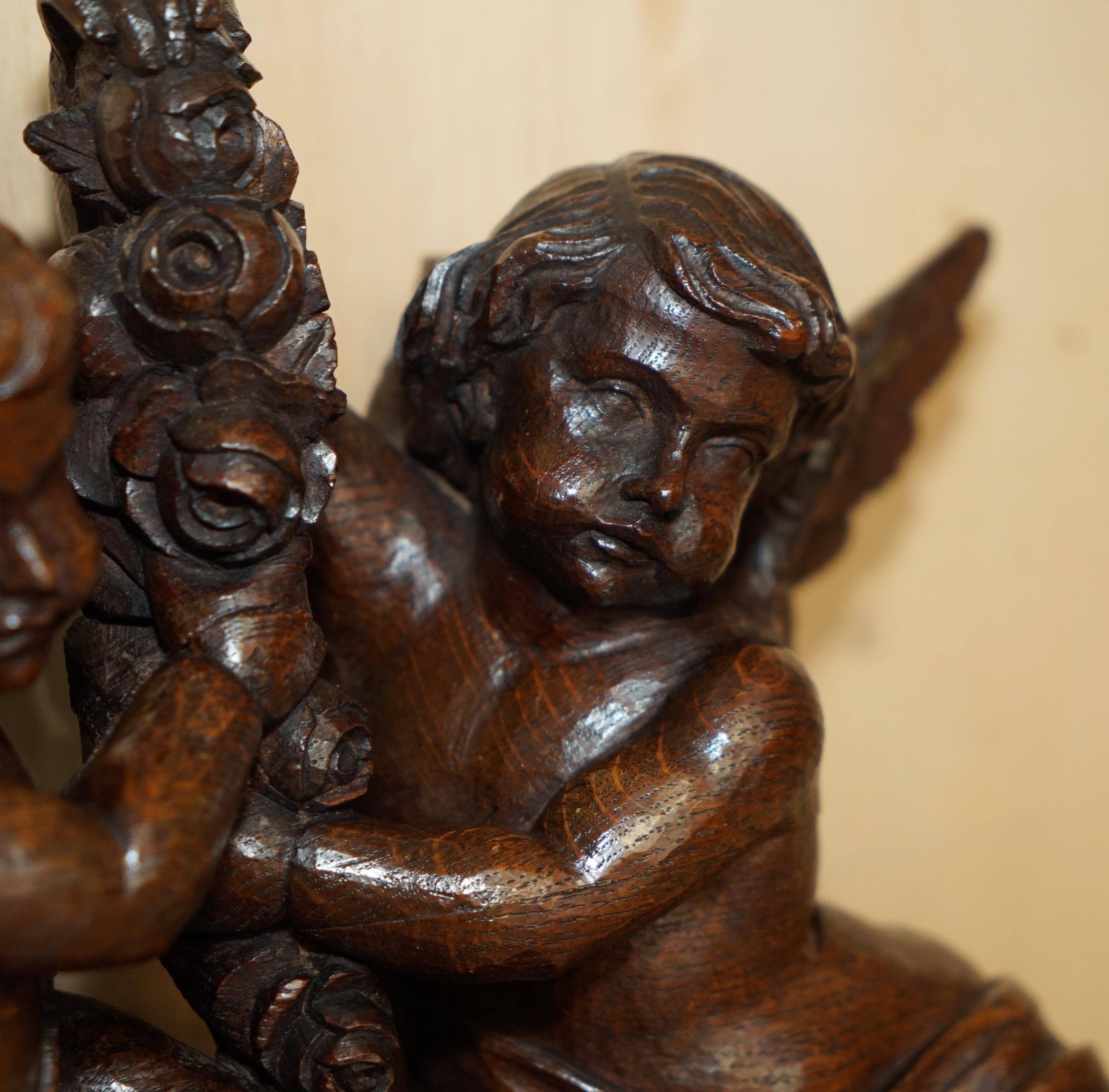 Oak IMPORTANT 17TH CENTURY CIRCA 1680 OAK CARVED SURMOUNT OF CHERUB ANGELS & FLOWERs For Sale