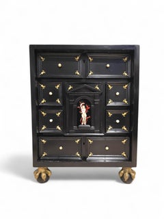 Important 17th Century Italian Ebonized Cabinet with Gilt Bronze Mounts and Sain