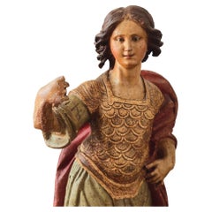Important 17th Century Italian Polychrome Wood Sculpture of a Juvenile Saint Geo