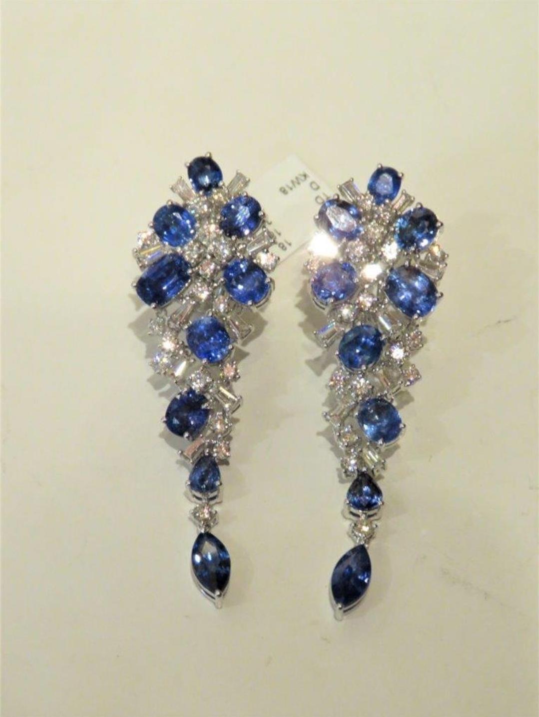 The Following Items we are offering are a Rare Important Estate Radiant 18KT Gold Large Gorgeous Fancy Ceylon Sapphire and Diamond Exquisite Dangle Chandelier Earrings. Earrings are comprised of Beautiful Glittering Diamonds!!! T.C.W. Approx 
