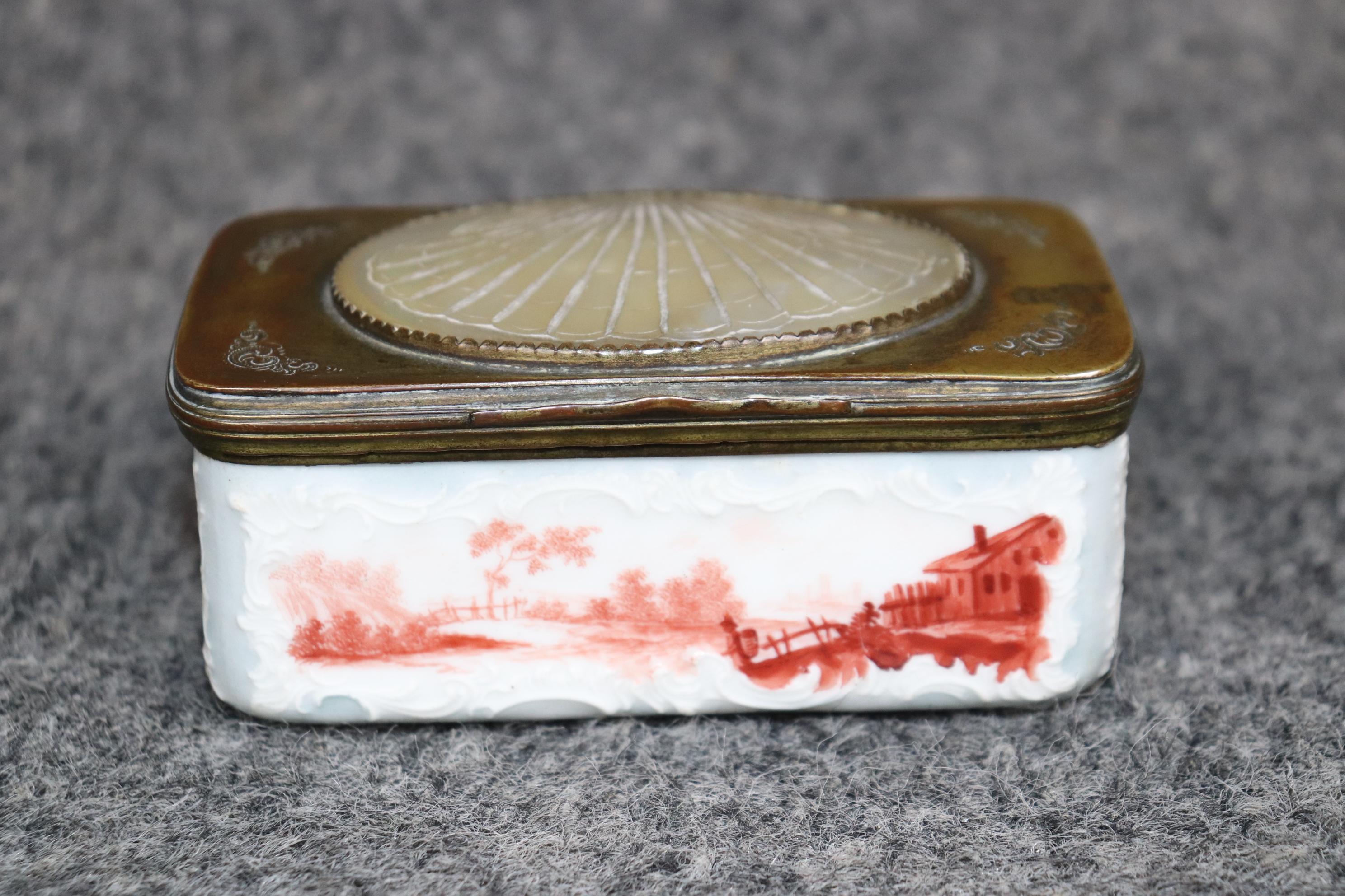 Dimensions - H: 1 3/4in W: 3 1/2in D: 2in 

This Mid 18th Century Porcelain and Bronze Box by Meissen is truly a spectacular piece and is of the highest quality! If you look at the photos provided you will see the attention to detail within the