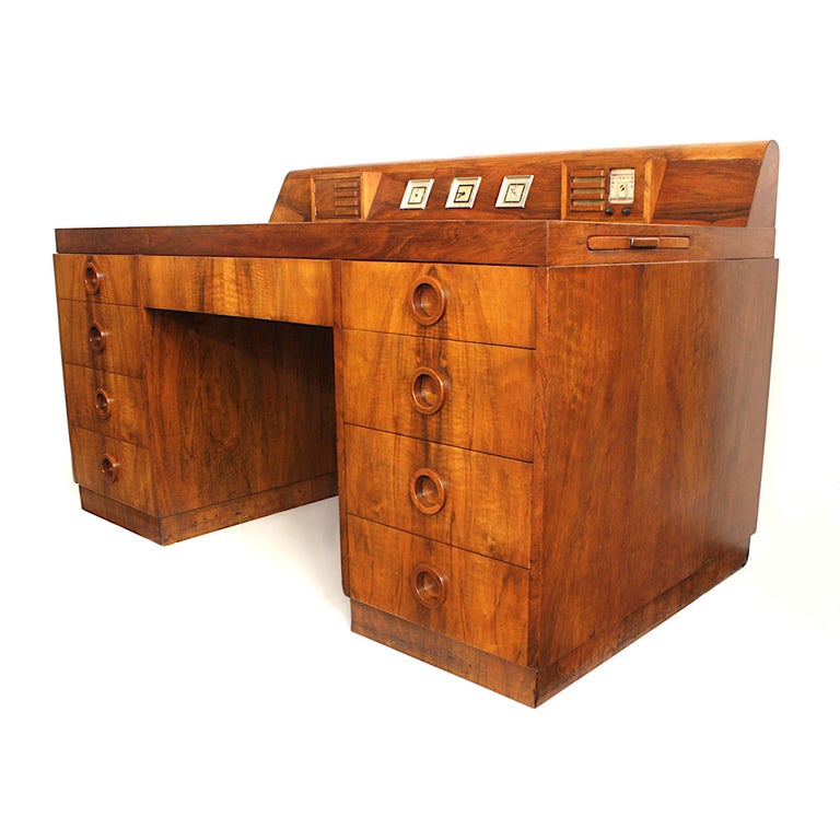 If it appears this 1930s Art Moderne desk has a dashboard, that's by design... The design of renowned automotive designer/illustrator and 'master of streamlining', Count Alexis de Sakhnoffsky. The count was famous for his wonderfully stylized