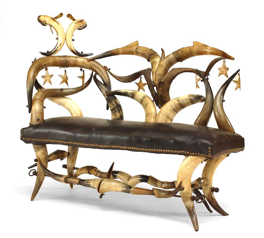 Rustic American Victorian steer horn chaise with stars & leaping fish motif (Attributed WENZEL FRIEDRICH).
 