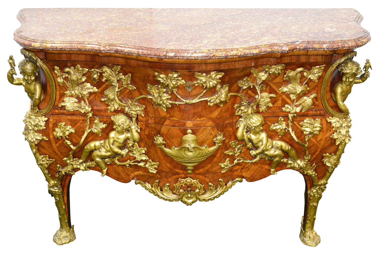 An important French mid-19th century gilt-bronze mounted kingwood, satiné and parquetry bombé commode after the model by Charles Cressent
attributed to Maison Millet, Paris
the serpentine Brocatelle Violette d'Espagne marble top above two long
