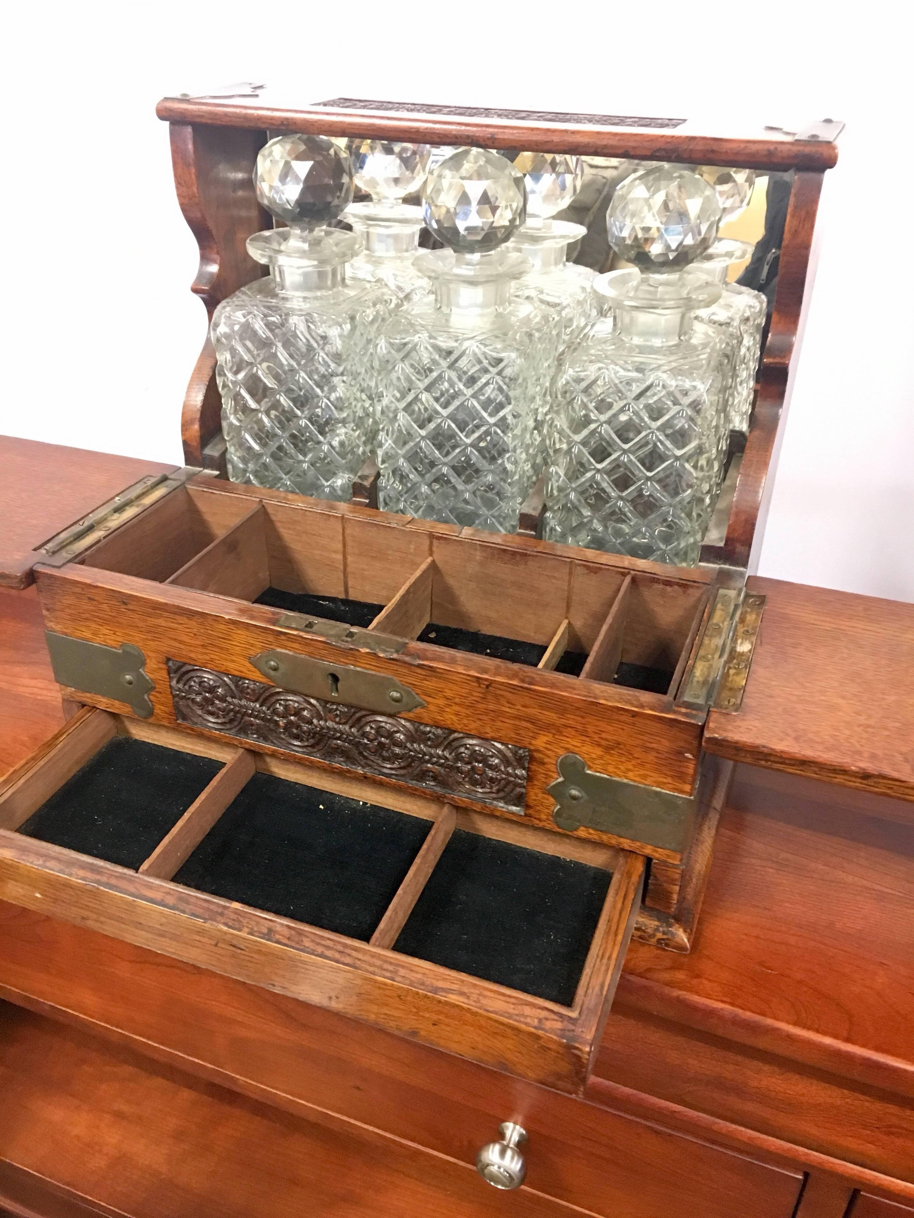 19th Century English Oak and Crystal Tantalus Decanter Set at 1stDibs