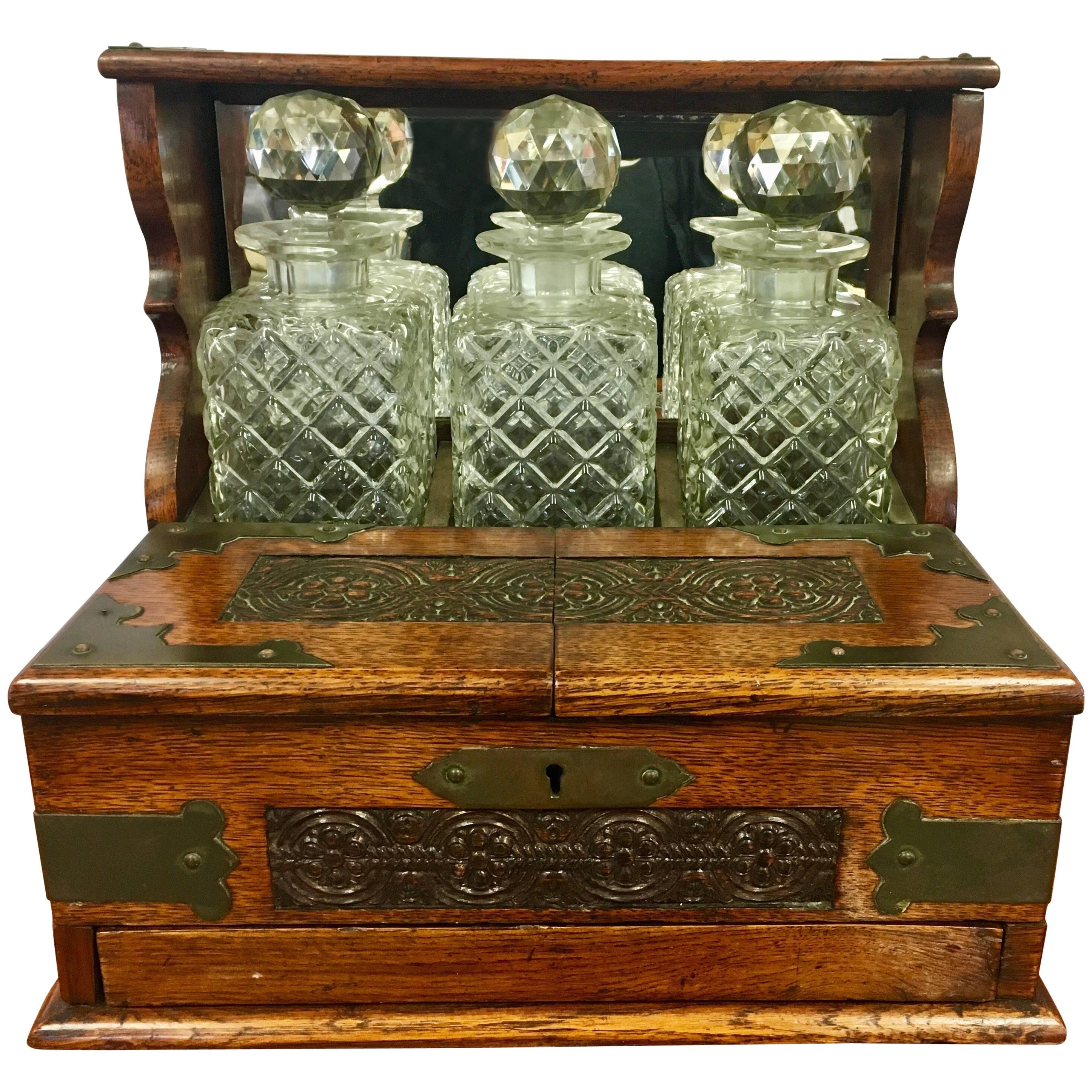 19th Century English Oak and Crystal Tantalus Decanter Set