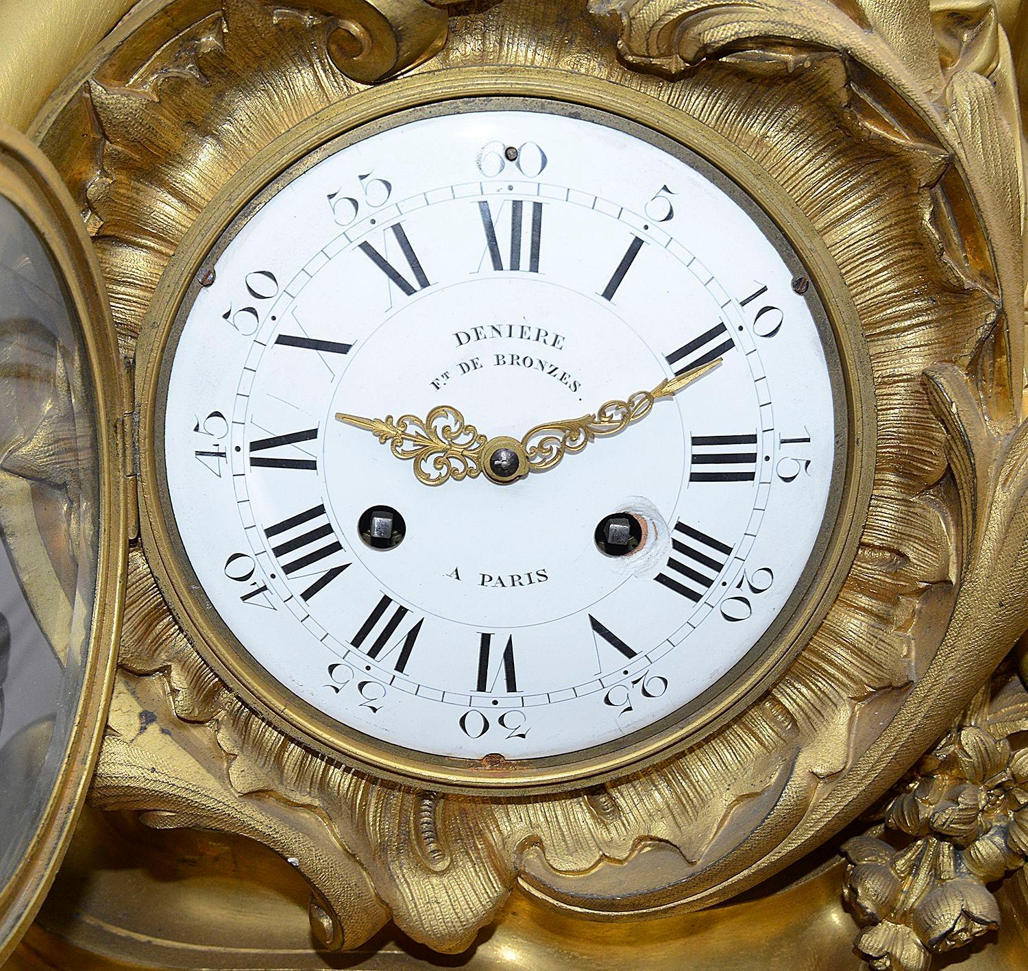 Gilt Important 19th Century French clock garniture by Deniere. For Sale