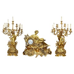 Importante garniture d'horloge française du 19ème siècle par Deniere.