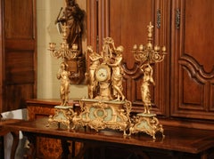 Important ensemble de pendules en métal doré et onyx du 19ème siècle signé E Rancoulet