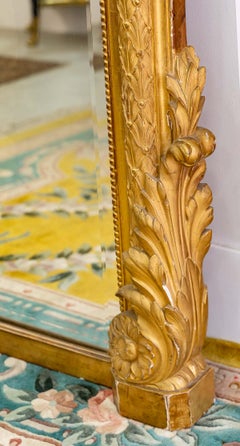 Important 19th Century Gilded and Stuccoed Wood Pediment Mirror