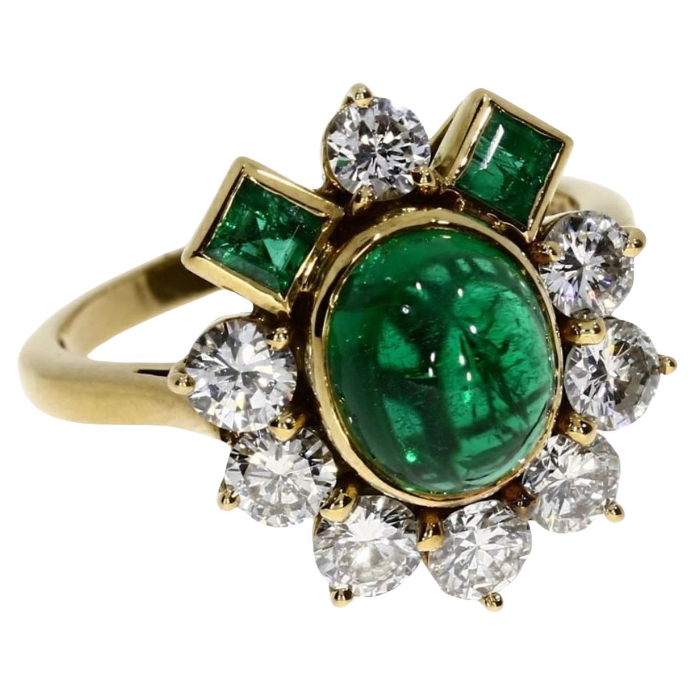 An exquisite vintage Emerald and diamond parure set by a famous french jewerler

The necklace is comsposed by 15.30 carat fine cabochon emeralds, 6.20 carat  square emeralds, and 14.40 carat  E color VS clarity natural diamonds set in 18k yellow