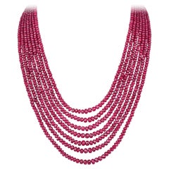 Important collier à plusieurs rangs de perles de rubis 560 carats de 16 pouces