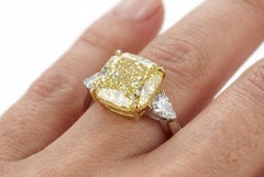 Important 6.83 Carat GIA Fancy Yellow Cushion Diamond Ring