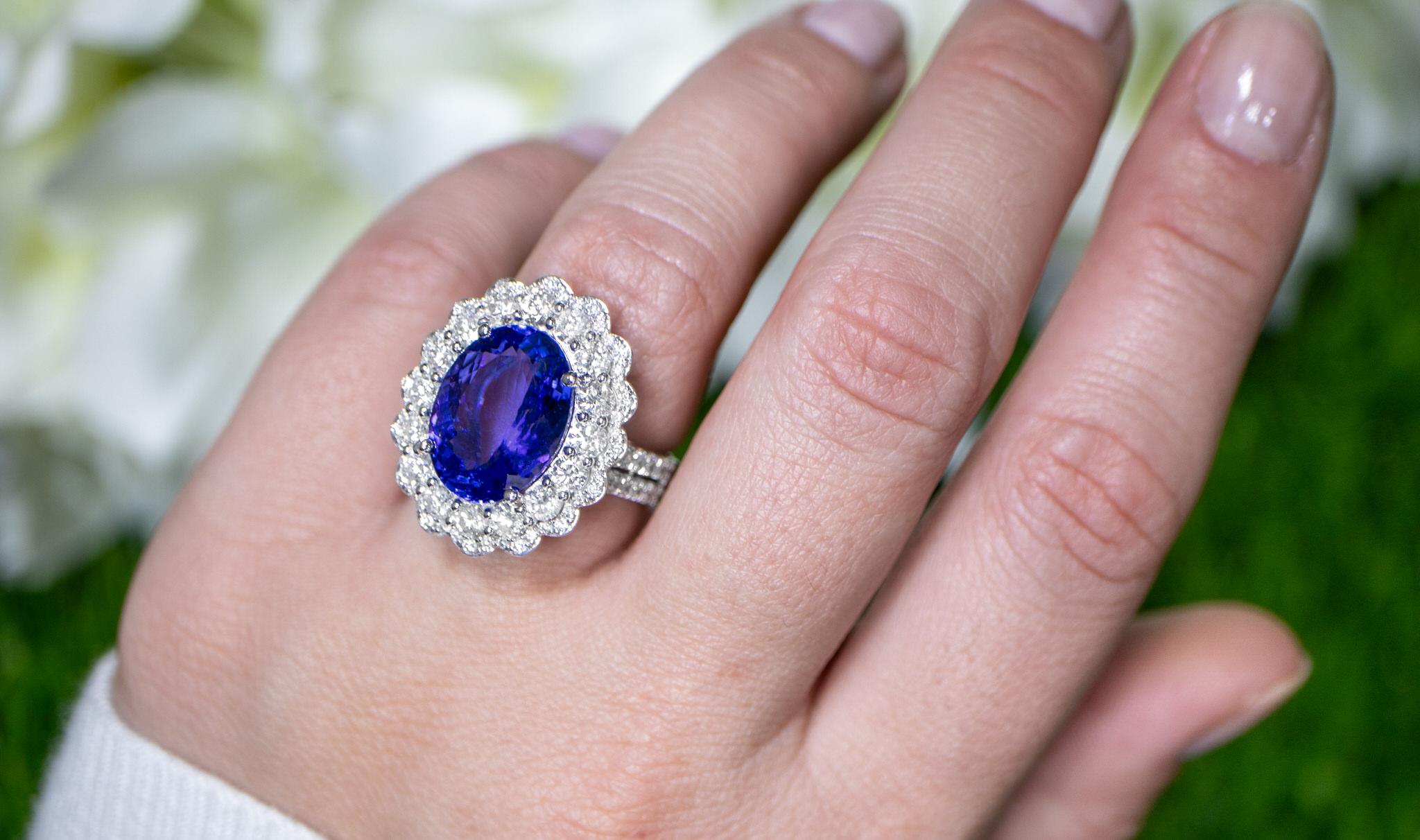 Contemporary Important 8 Carat Tanzanite Ring Large Diamond Halo 2.12 Carats 18K Gold For Sale