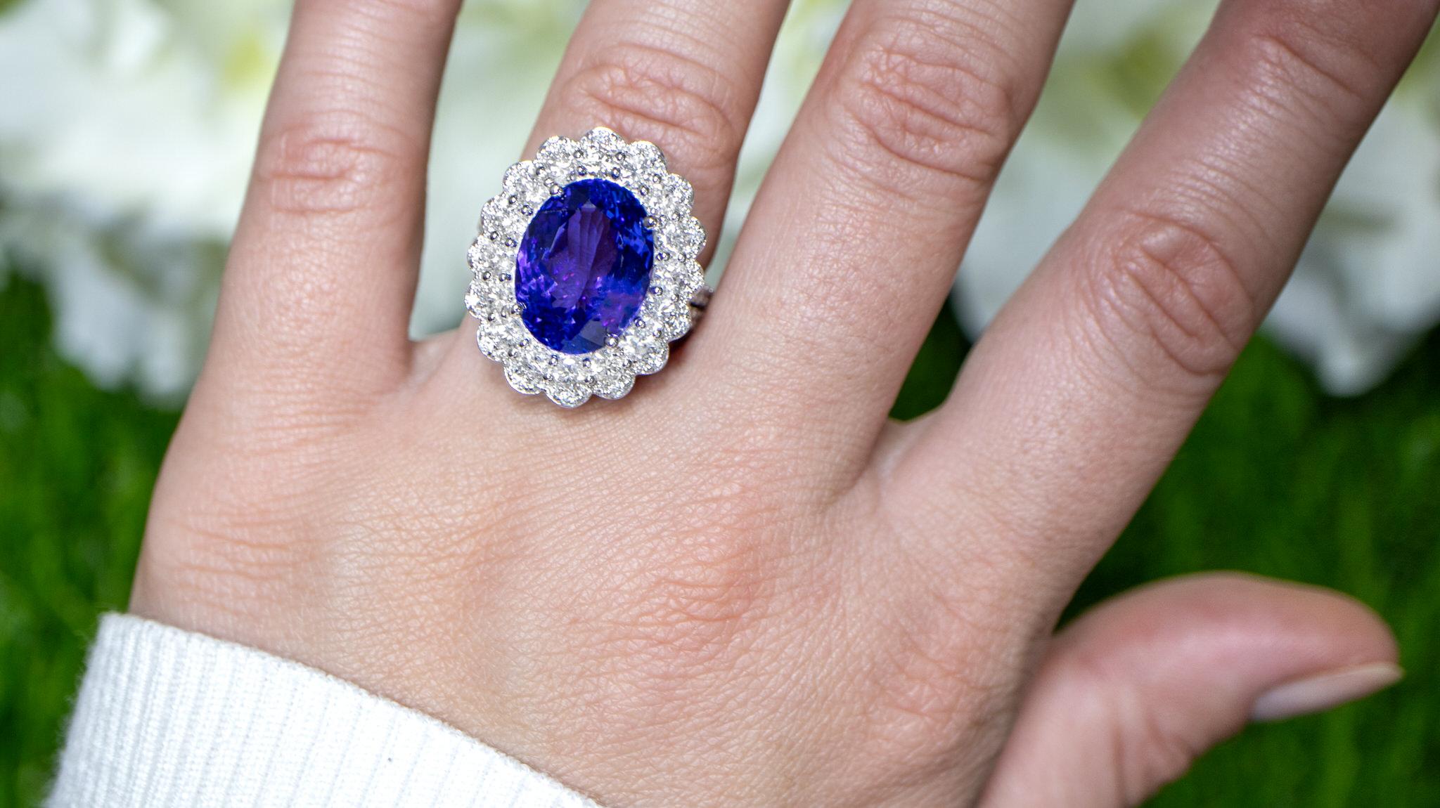 Oval Cut Important 8 Carat Tanzanite Ring Large Diamond Halo 2.12 Carats 18K Gold For Sale