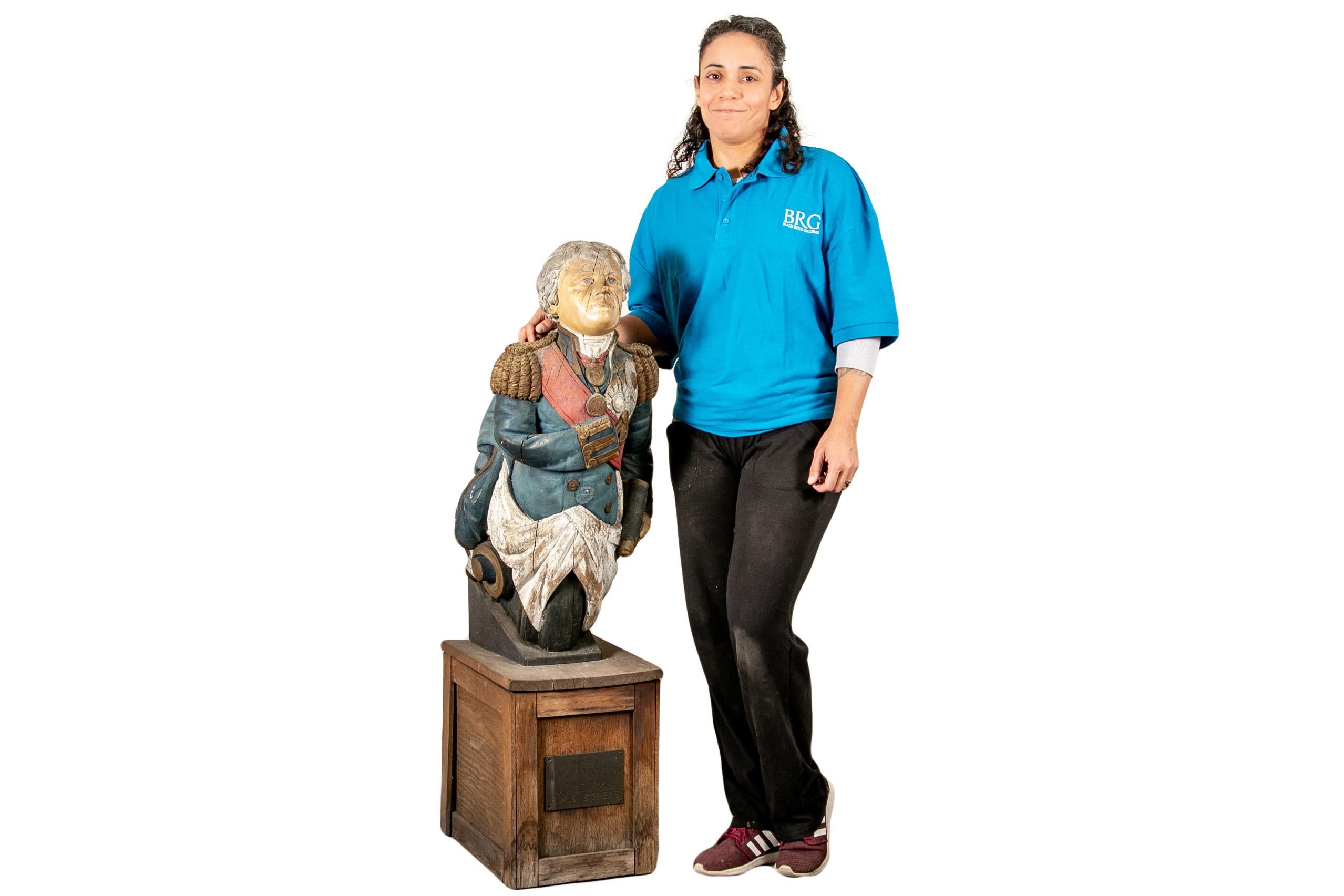 Carved and painted wood from the 21 gun Frigate H.M.S. Boreas. Mounted on a wood box with identifying plaque.
Nelson is shown with his short white wavy hair and dressed in the uniform that he wore at the seminal Battle of Trafalgar and wearing