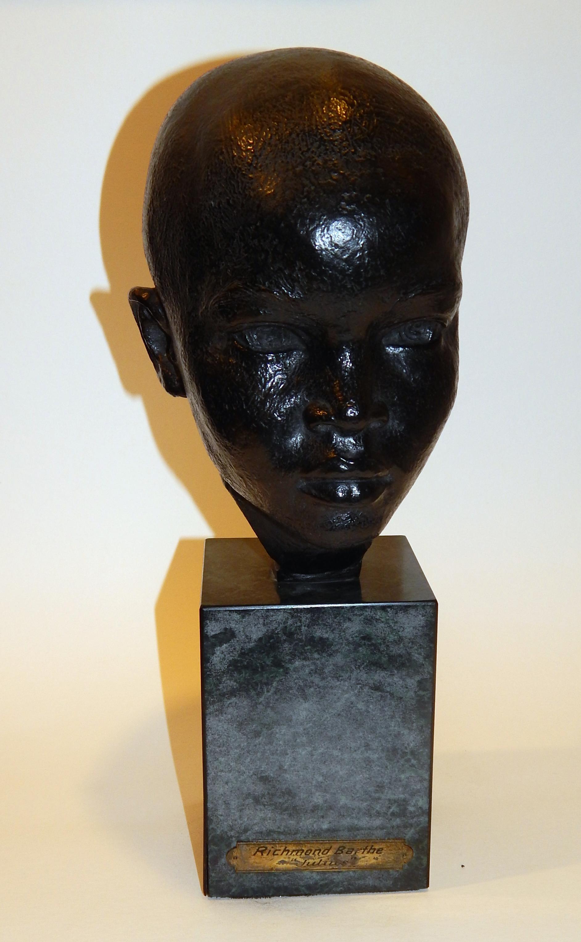 Bronze head with brown patina by Black artist Richmond Barthe (1901-1989), titled 