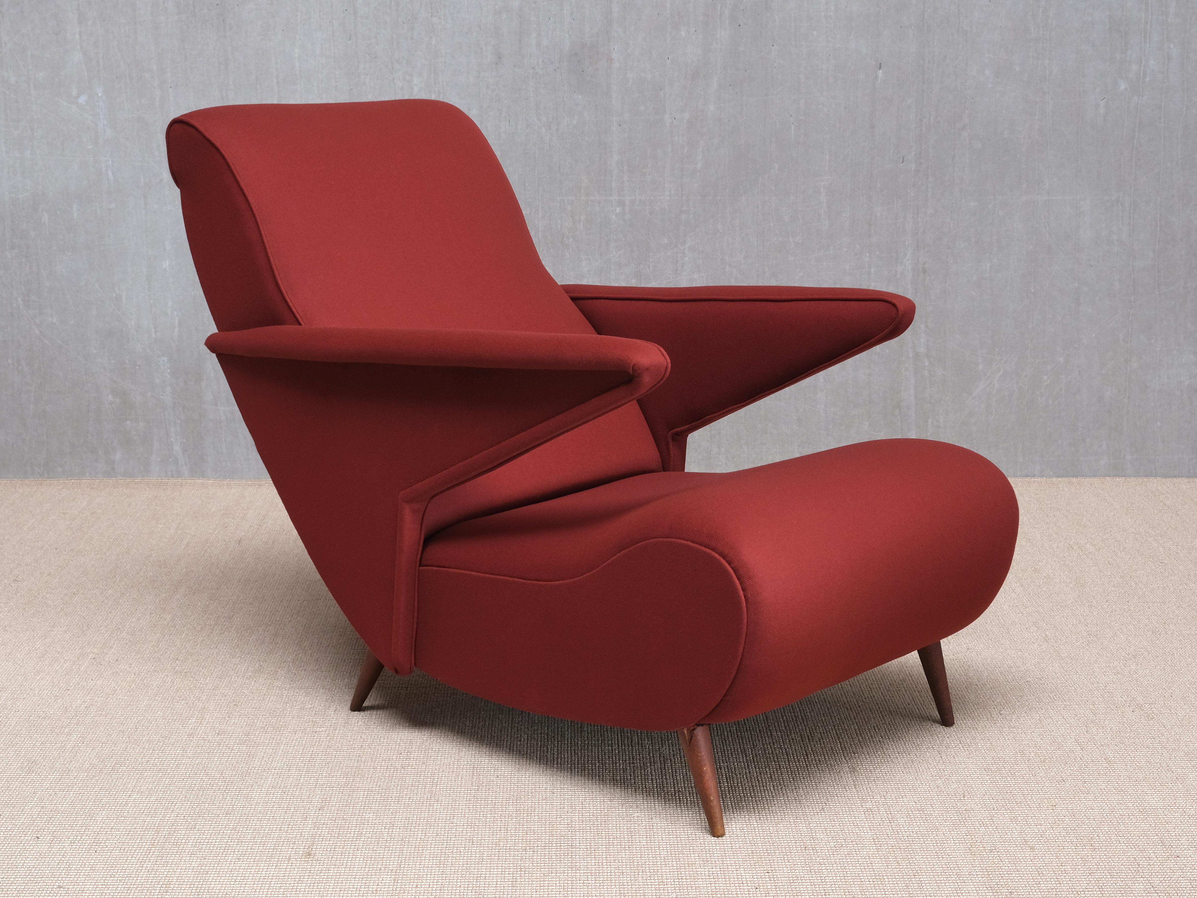 This important armchair was designed by Angelo Banfi and produced in Italy in 1944. Banfi was an architect active in Milan in the first half of the 20th century. His son, Gian Luigi Banfi, later became a well-known architect and a founding member of