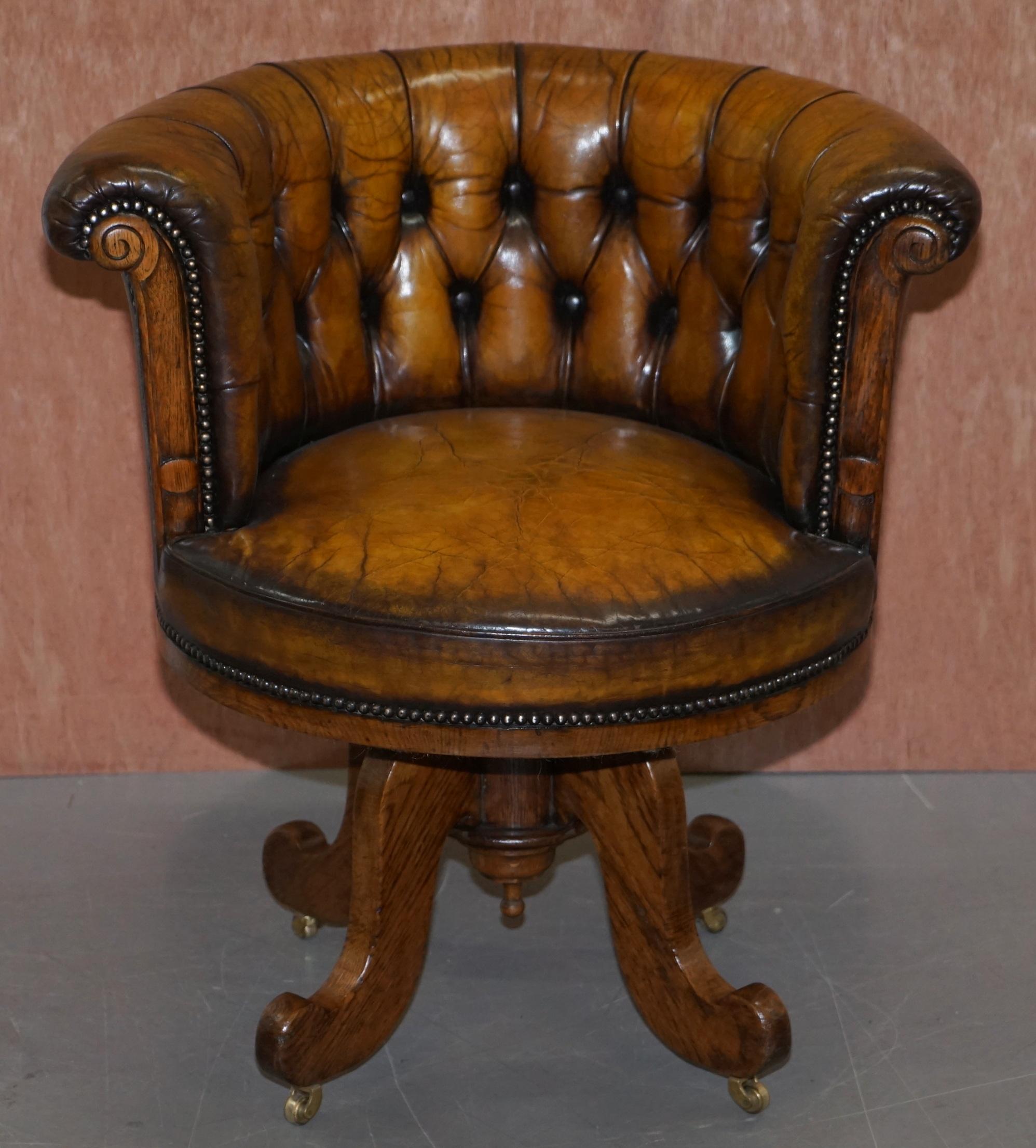 We are delighted to offer for sale this very rare and important fully restored circa 1860 barrel back Chesterfield hand dyed brown leather office chair

This chair is really quite exquisite, its one of the earliest types of swivel chairs I have