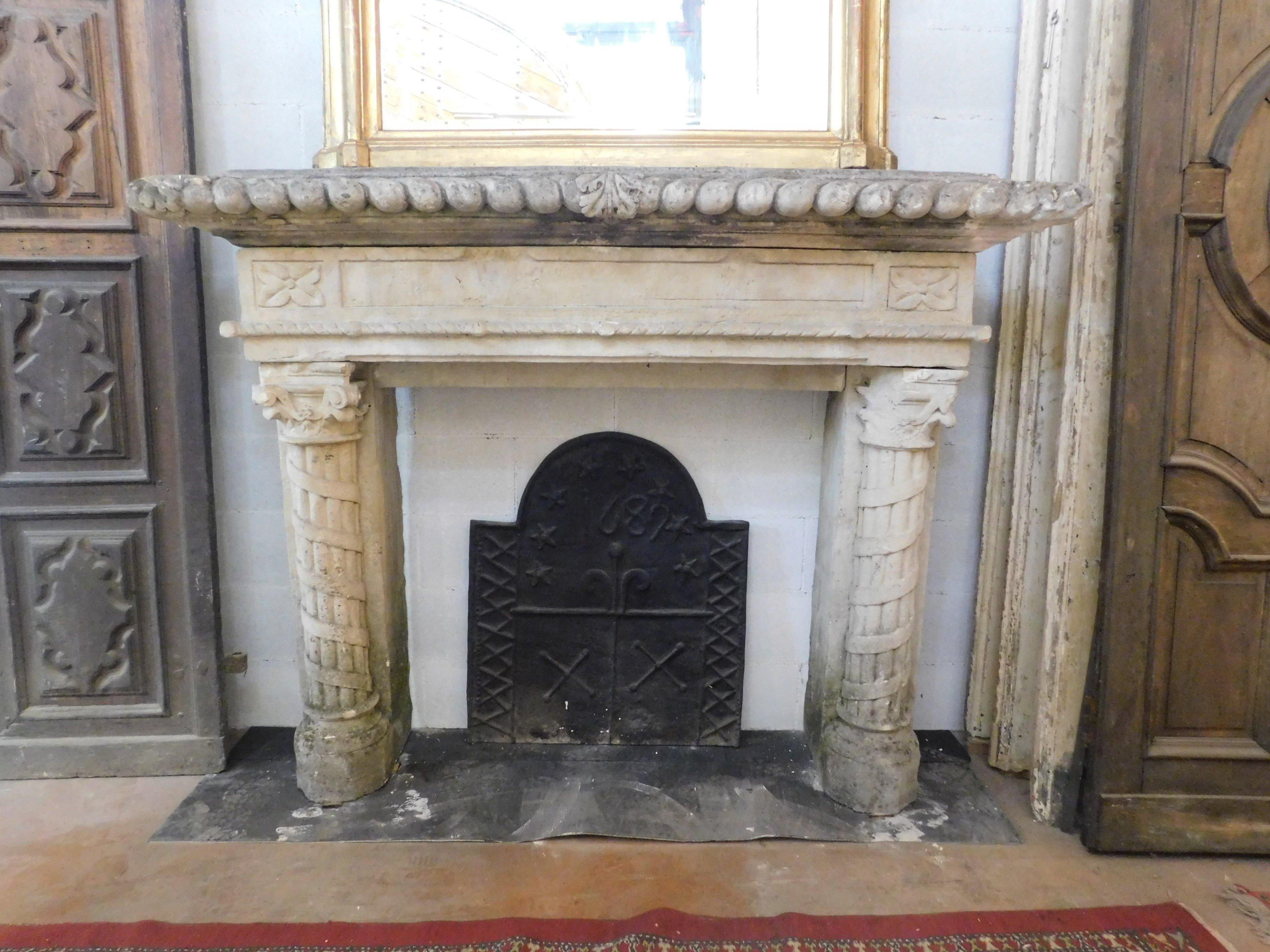 Important fireplace, ancient mantle for hearth in stone, richly carved and decorated by hand, columns with classic beam and and pediment with frame, hand-built in the late 19th century in Italy.
Ideal for decorating your warm corner, it can also be