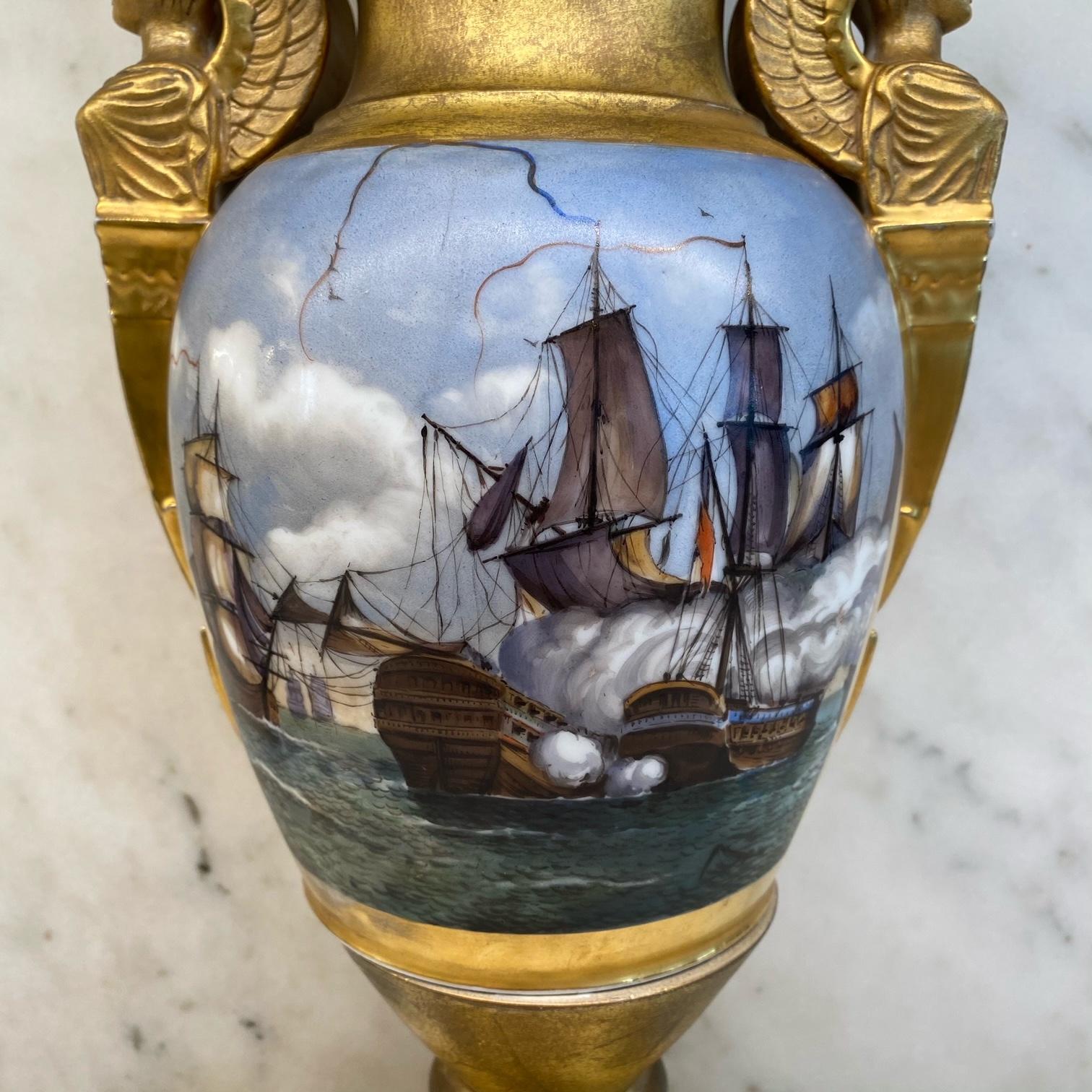 Beautiful 19th century important French vase with hand painted gold gilt crest or coat of arms on one side; a stunning hand painted and signed (artist indistinguishable) nautical painting of ships in battle on the other. The handles are magnificent