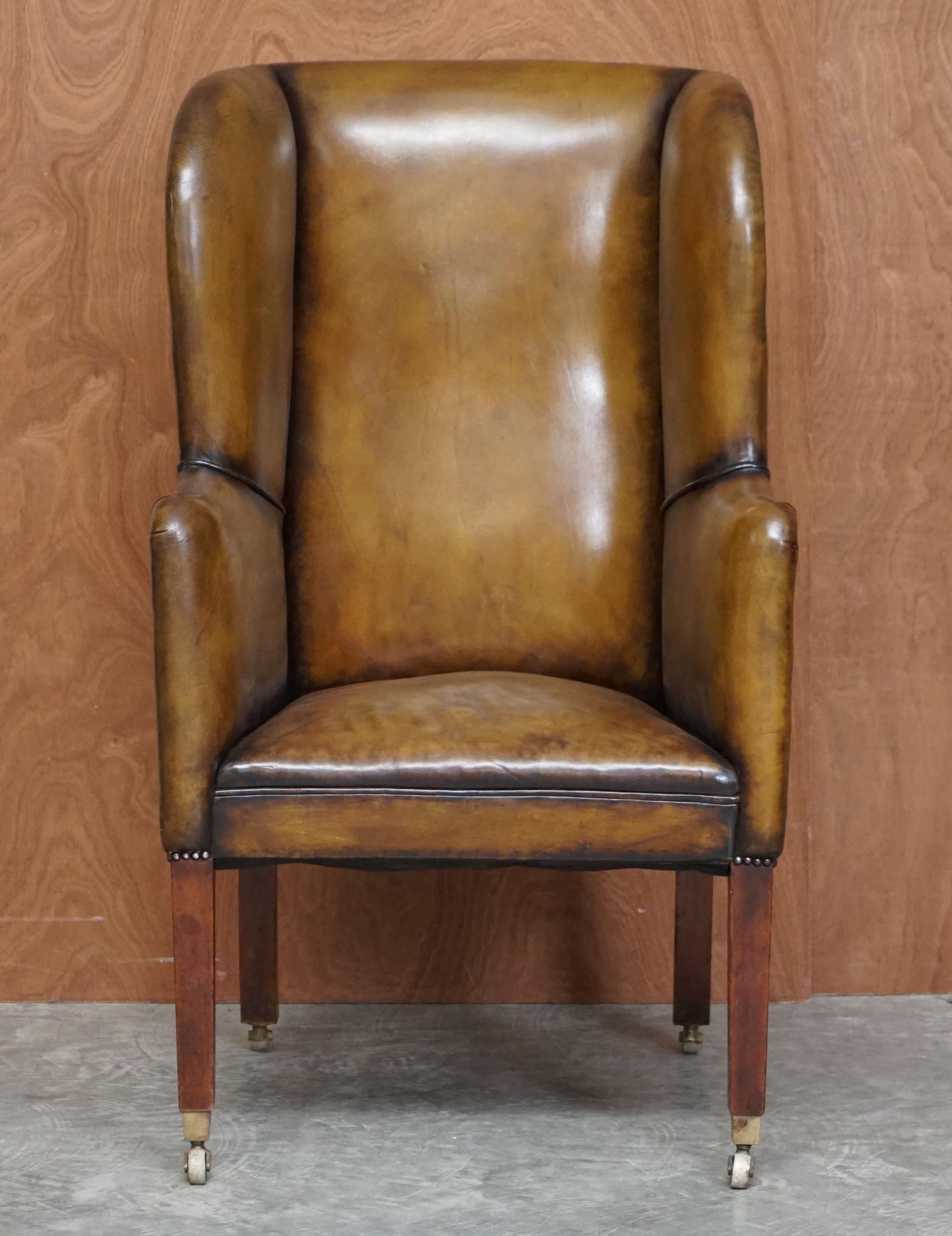 We are delighted to offer for sale this stunning fully restored hand dyed cigar brown leather Georgian Porters wingback armchair circa 1780.

A very good looking and highly decorative piece. This is an original Georgian circa 1780 armchair, the