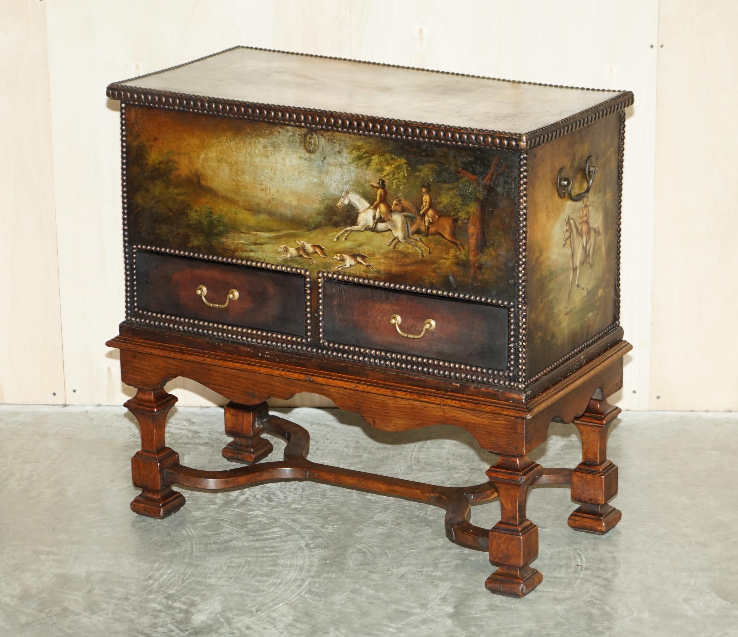 We are delighted to offer for sale this extremely important, museum quality, hand painted leather clad trunk on stand depicting rural scenes with horses

Where to begin, firstly I don’t want to sell this, it is without a doubt the most stunning