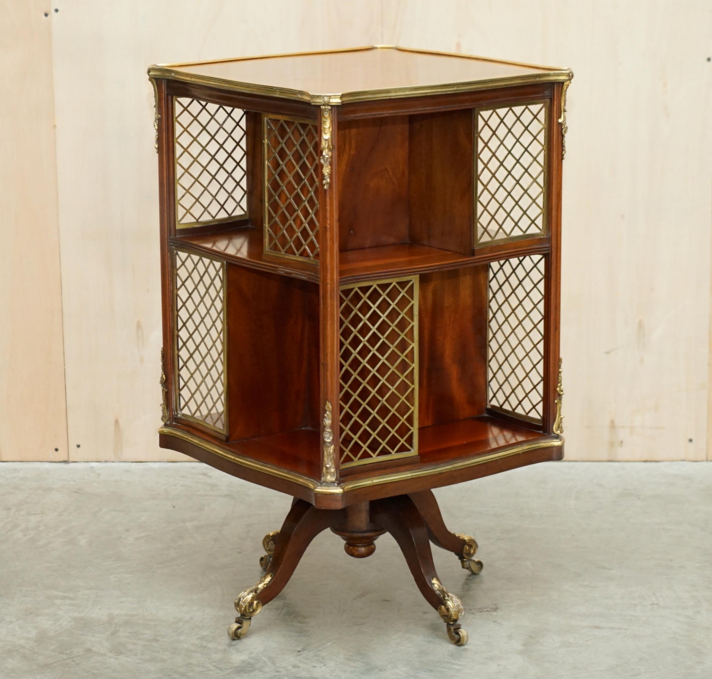 We are delighted to offer for sale this important, fully restored original Regency circa 1810-1820 brass and walnut revolving book table of museum quality

This is the finest quality book table in the world, it literally belongs in a museum, I