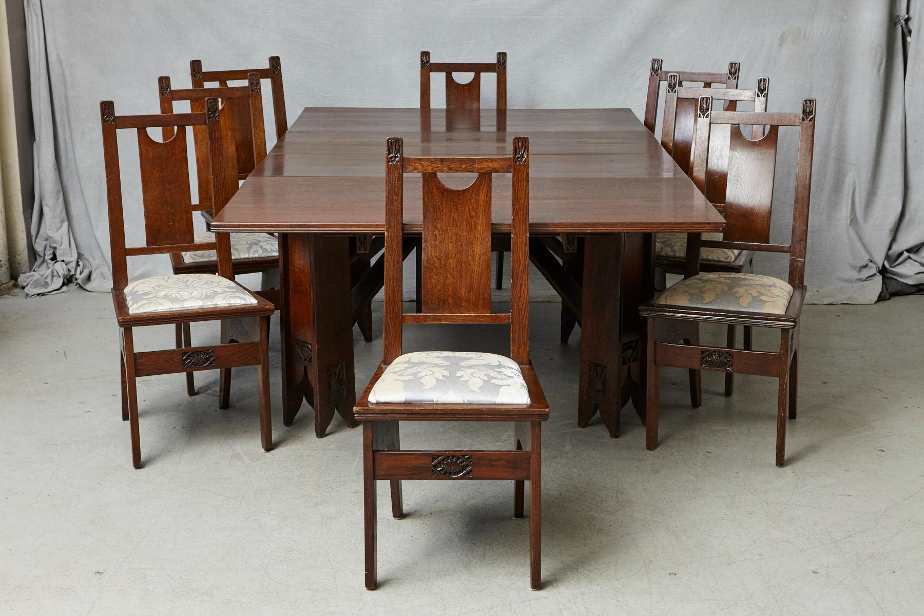 A very important and rare complete Art Nouveau dining room set, table and eight chairs, designed by the architect Ernesto Basile and manufactured by Ducrot Furniture, circa 1899 - 1909.

The extendable table and the eight chairs are in good