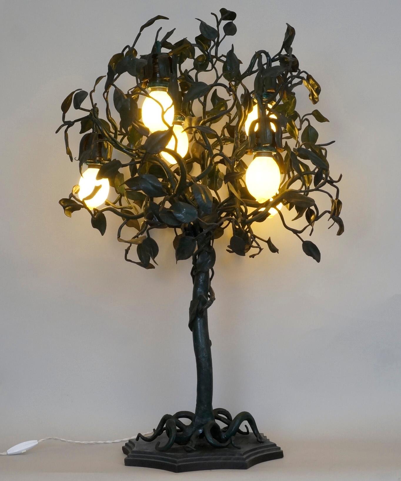 Wrought iron table lamp, lemon tree.
Rewired with twisted silk cord. 
Bulbs: lemon in glass
20th century
Measures: Height 76 cm - 29.9 in.
 