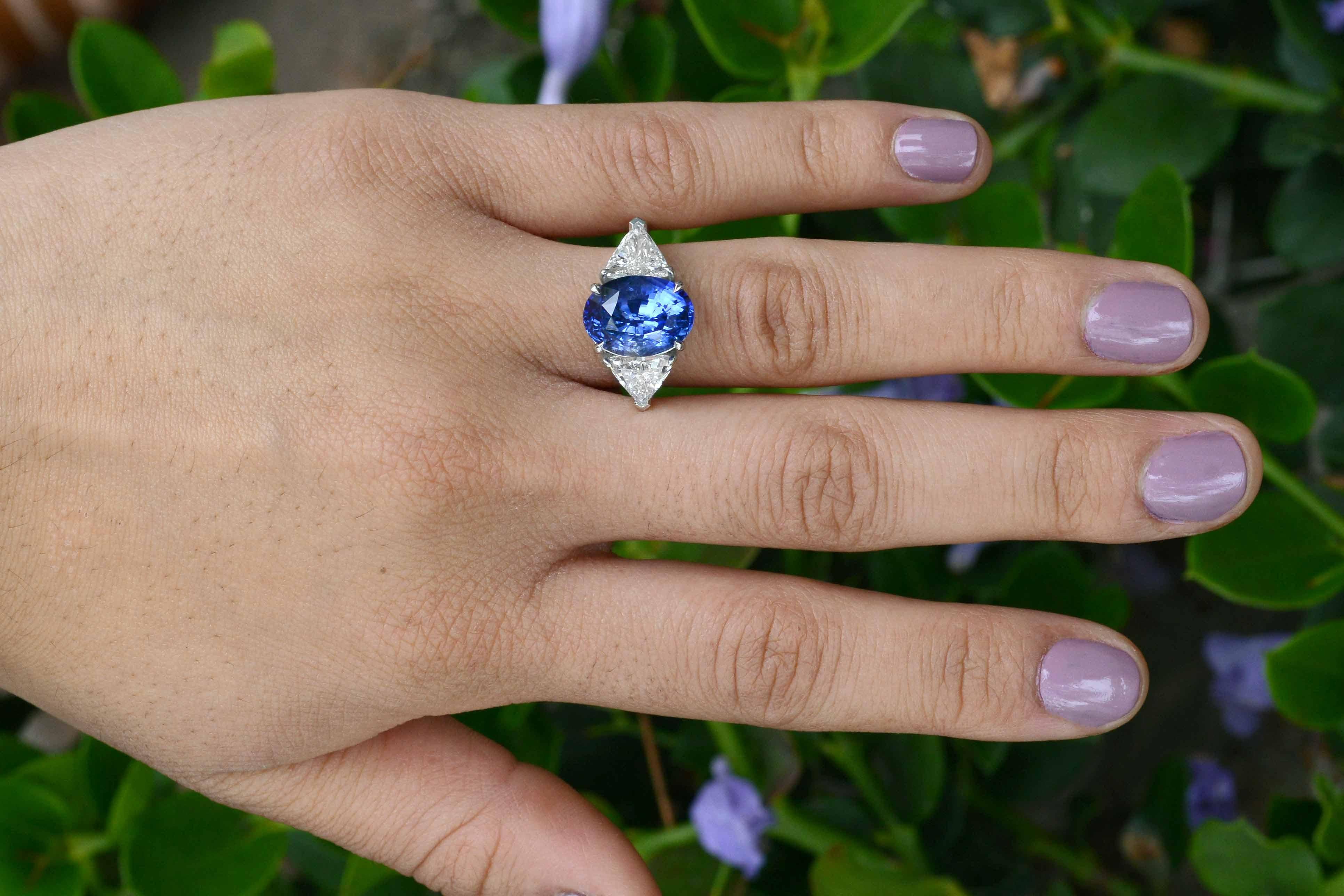 The Palo Alto trinity ring. An important sapphire and diamond 3 stone ring with a WOW factor second to none. Worn as an engagement ring or statement cocktail piece, it is hard to miss. Centered by a near 7 carat oval gemstone with an incredible,