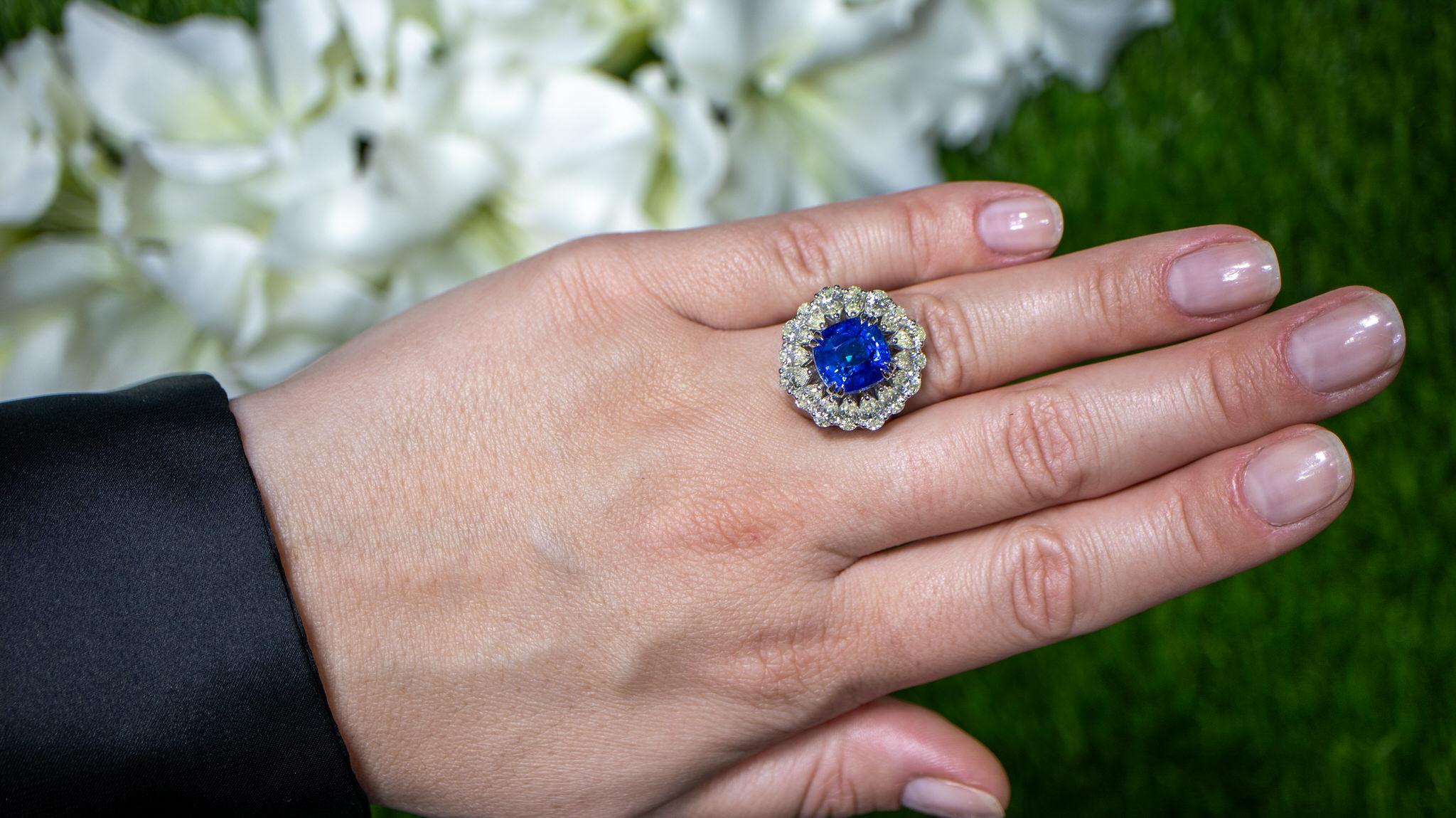 It comes with the IDL Certificate
All Gemstones are Natural
Blue Sapphire = 6.96 Carat
Diamonds = 2.89 Carats
(Color: I, Clarity: VS-SI)
Metal: 18K Gold
Ring Size: 6.75* US
*It can be resized complimentary