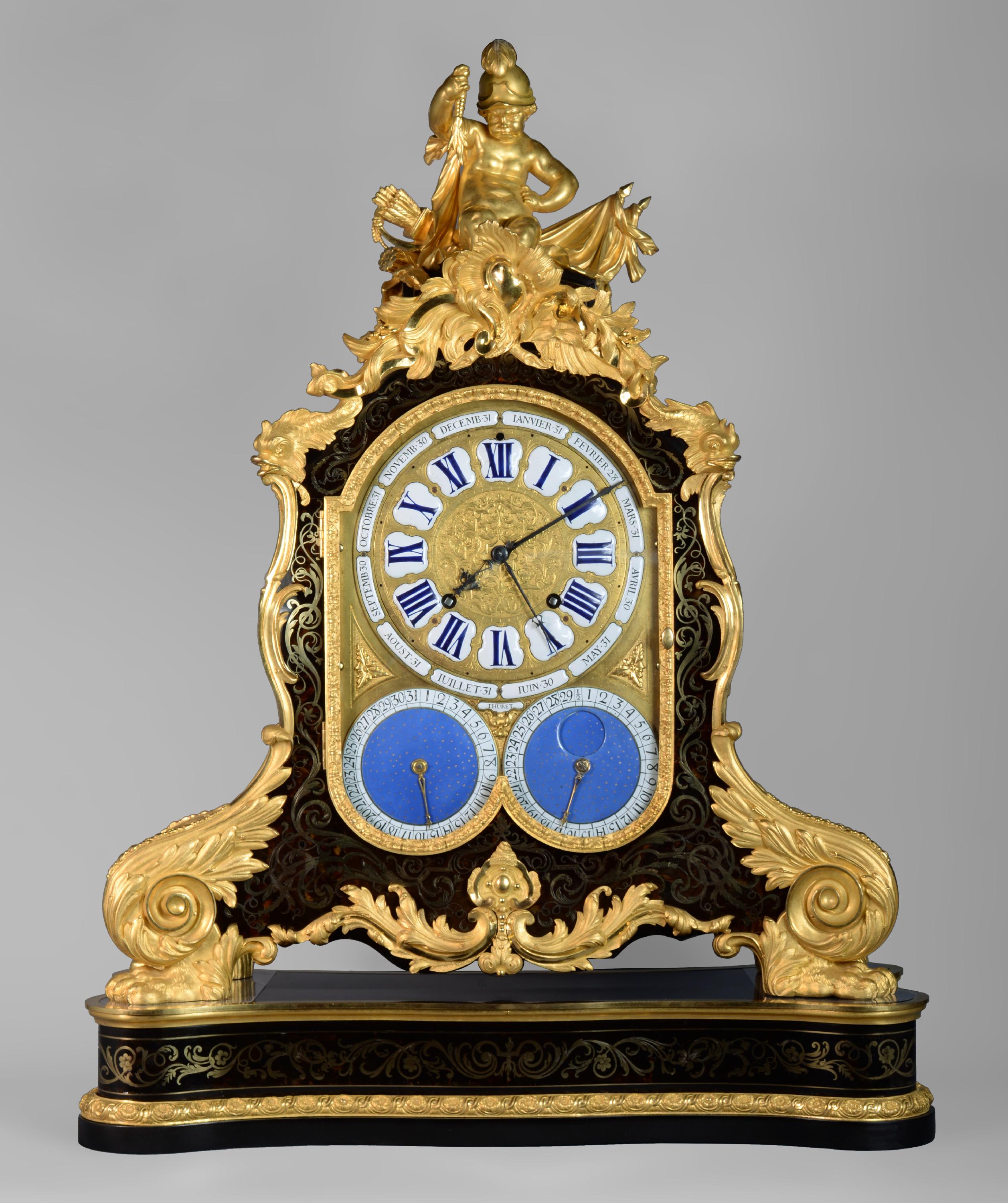 This exceptional cartel presents a remarkable work of bronze and an ornamentation resuming the Boulle marquetry that can be attributed to Alfred-Emmanuel Beurdeley (1847-1919), a great Parisian cabinetmaker of the second half of the 19th century.