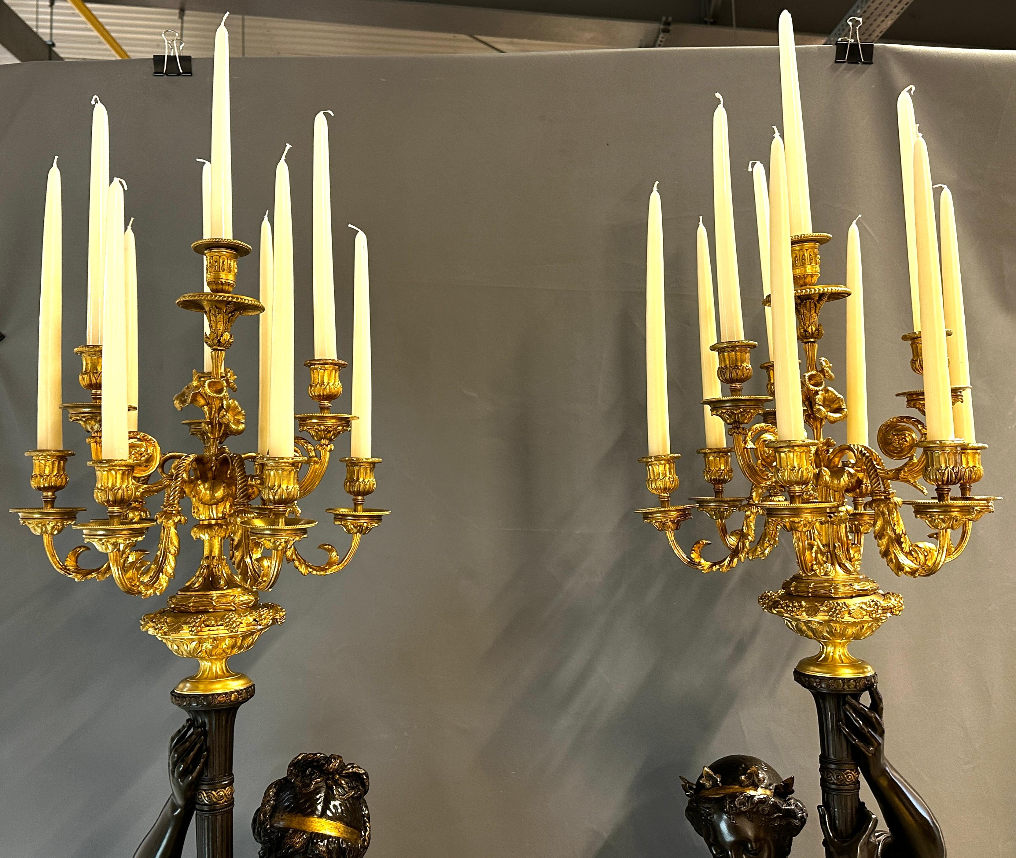 These figural torchères of Contrapposto classical maidens supporting candelabra embody the belle époque fashion for grand interior lighting and were conceived to flank an impressive staircase or doorway. They are reminiscent of the monumental