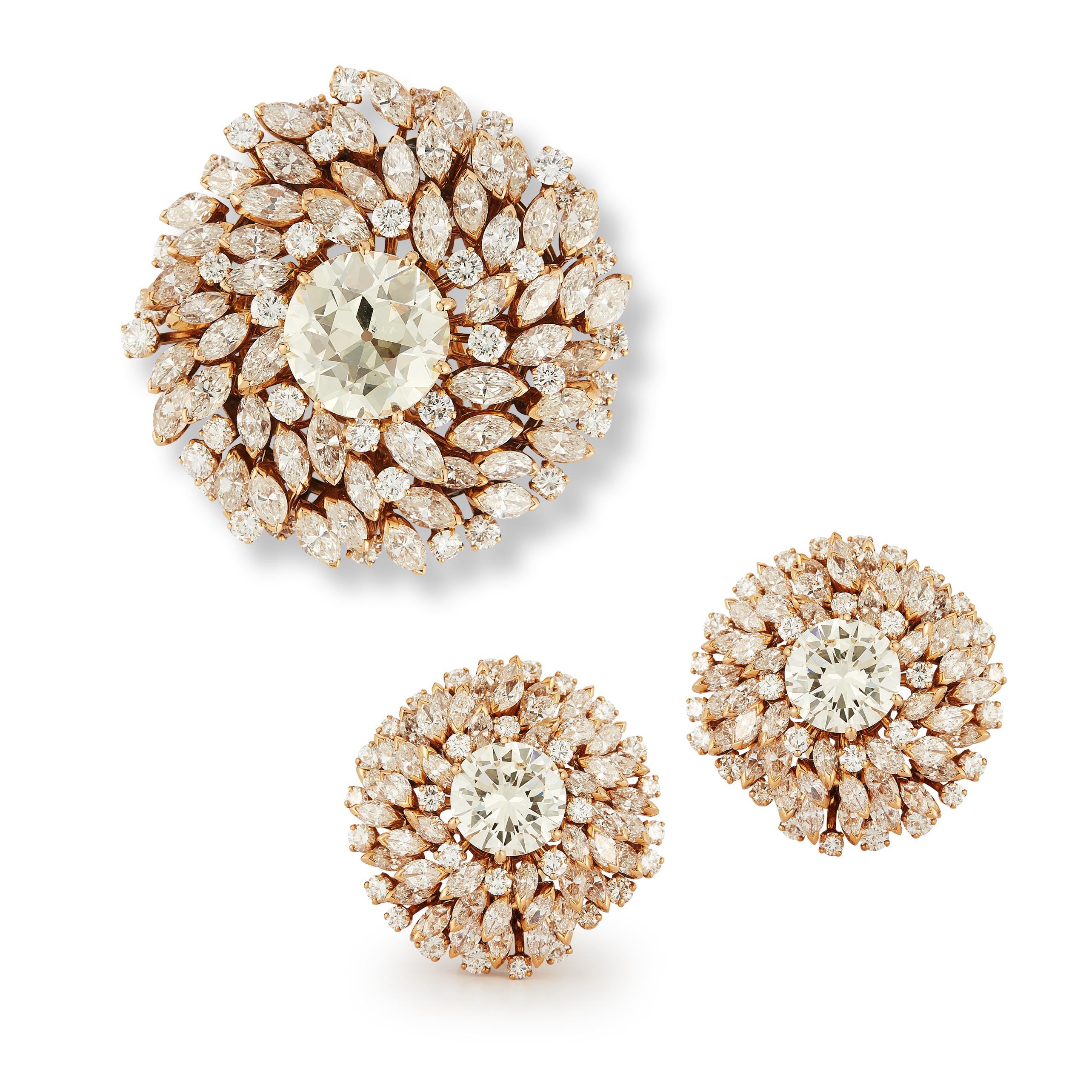 Bulgari Diamond Brooch & Earrings Set 

Brooch: 
1 Old European Cut diamond approximately over 9.00 carat
Set with 58 marquise cut and 38 round cut diamonds 

Earrings:
2 center Round diamond weigh approximately 3.00 cts  each
Set with 92 marquise