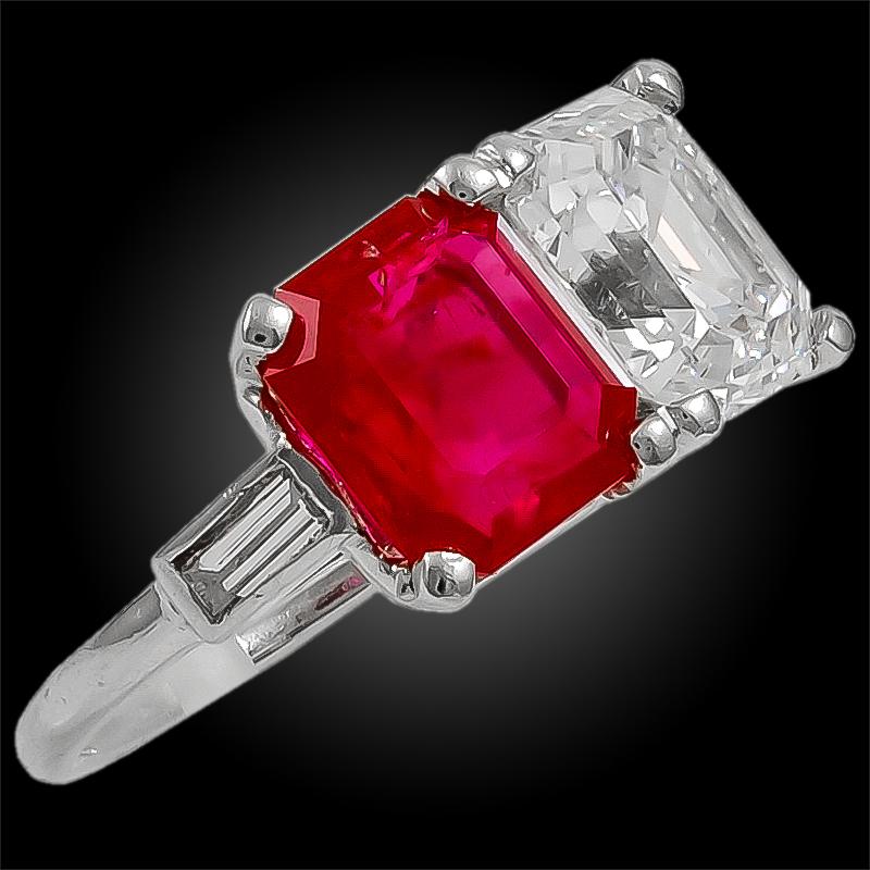 Rare Cartier ring comprising an emerald-cut diamond and an emerald cut Burma no-heat ruby weighing approximately 3.07 carats, aligned side by side.
Signed Cartier.
Burma ruby weighing approx. 3.07 cts. with AGL cert.
Ring size 5 3/4