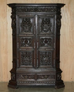 IMPORTANT CARVED NEO RENAiSSANCE ARMORIAL COAT OF ARMS ANTIQUE WARDROBE ARMOIRE