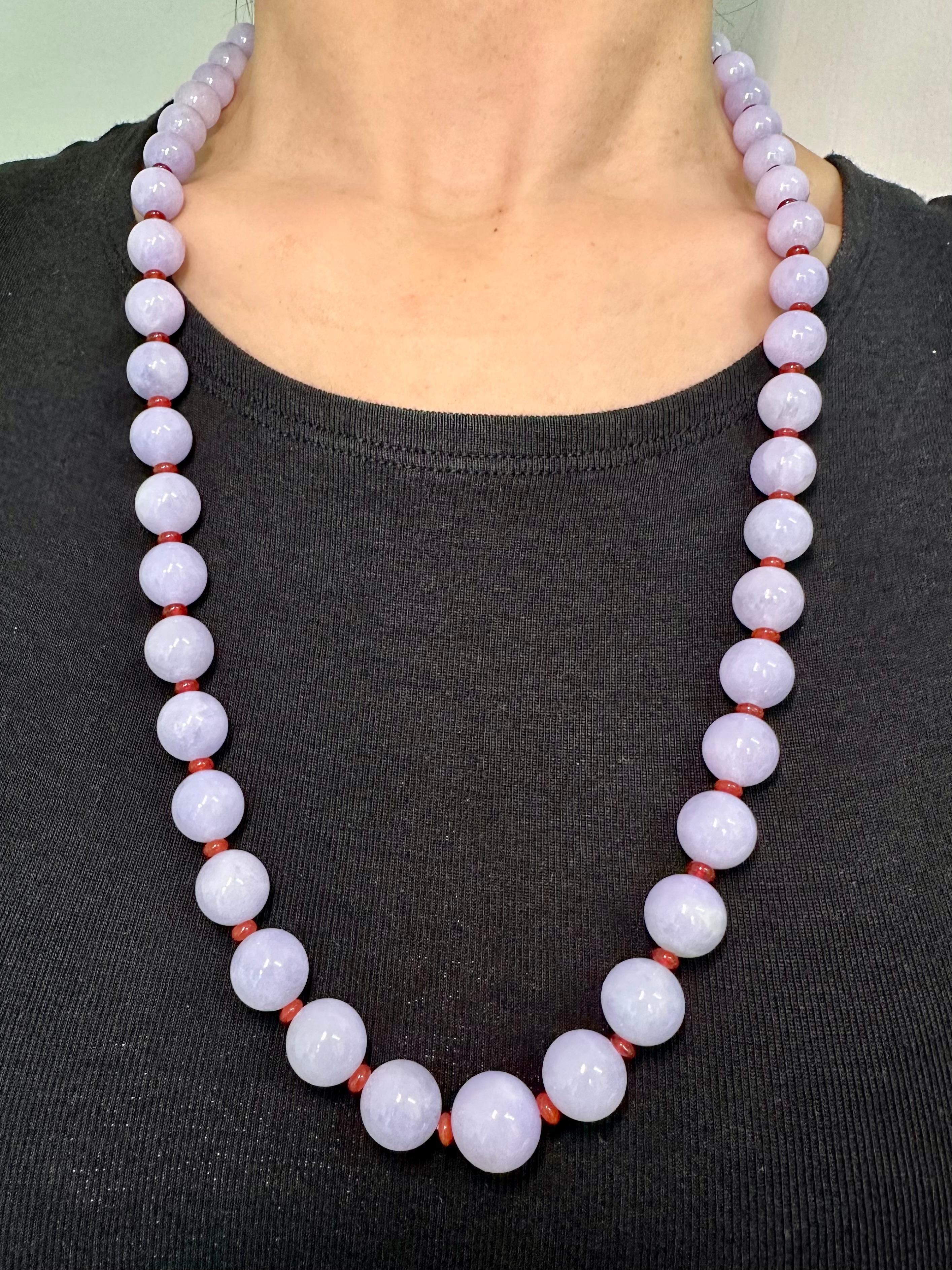 Please check out the HD video! For your consideration is an important natural lavender jade and diamond necklace. Natural Lavender jade beads of this color are rare and not often seen. There are 49 jade beads ranging from about 9.6mm - 13.5mm in