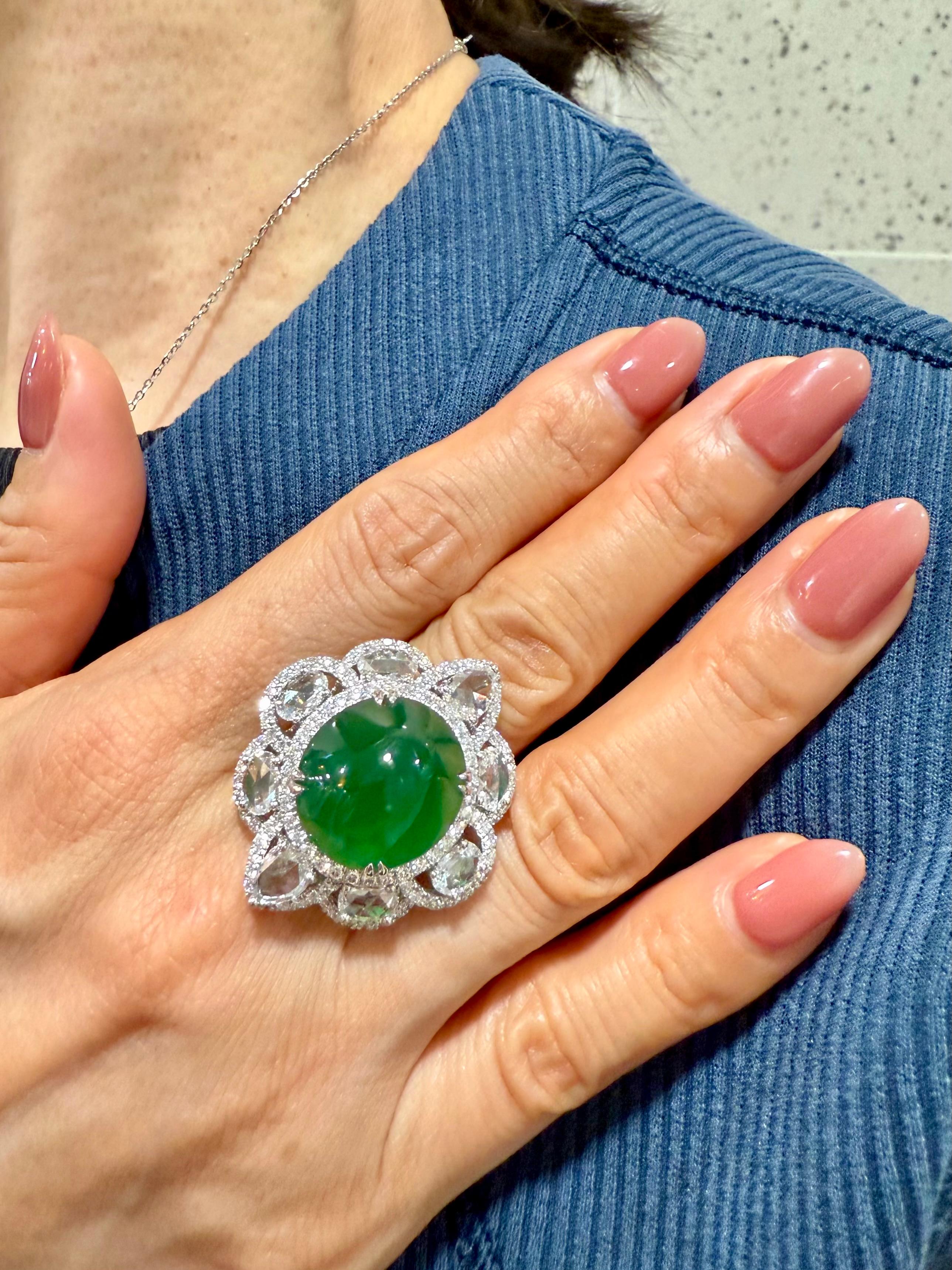 This important Jade ring is located in the USA and can be shipped domestically within USA. Please check out the HD video. HUGE statement piece! The best of the best materials used! The GLOW (under normal light) on this jade is out of this world!