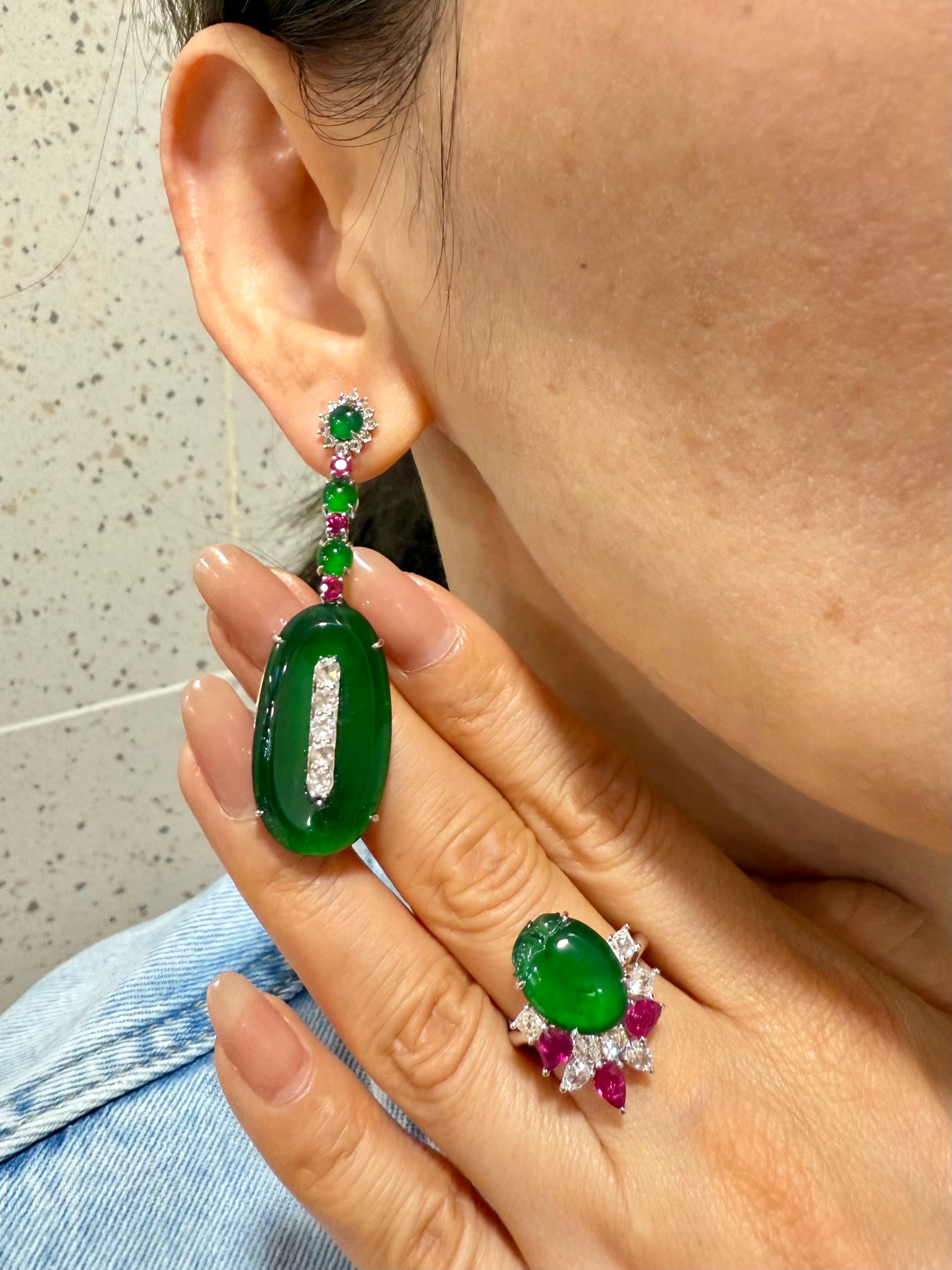 Please check out the HD video! These earrings are important and substantial. Almost ALL jade of this color and quality are treated, but these are large and all natural without any treatments. Here is a pair of natural imperial Jadeite Jade, rubies