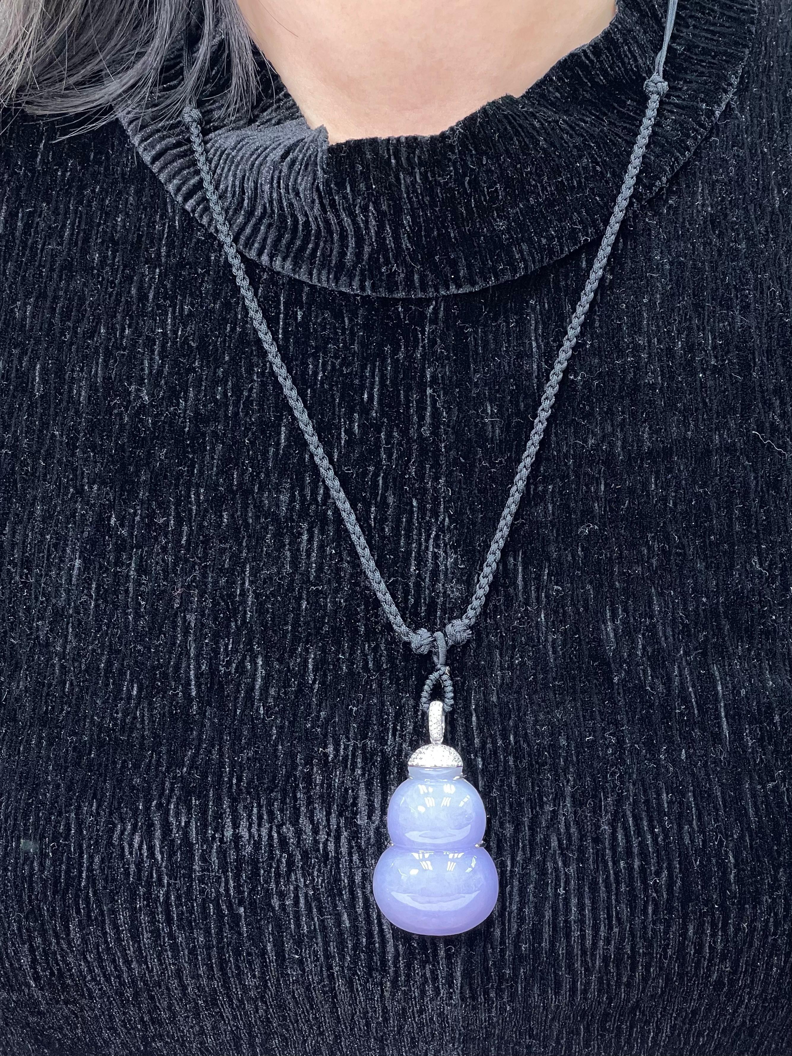 Here is an important natural lavender Jadeite Jade and diamond pendant necklace with excellent purple color. This is a substantial STATEMENT piece! The size is impressive but it also has thickness (about half inch thick) Most jade of this size would
