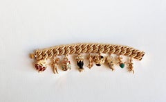 Important Charm Bracelet Yellow Gold 18 Carat amethysts pearls coral turquoise